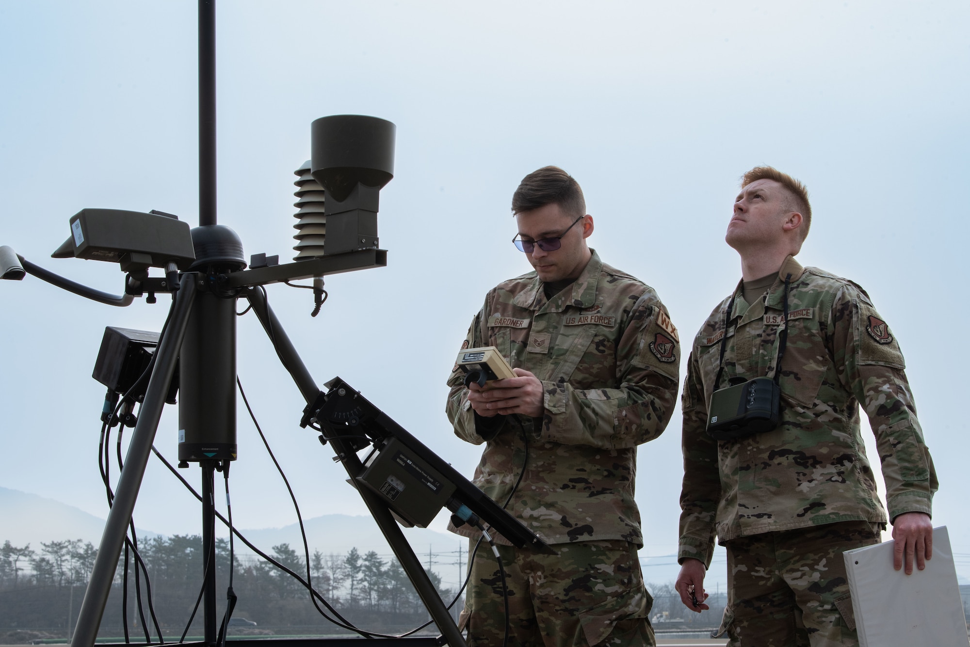 Photo of Airmen, Aircraft, operating on an alternate landing strip