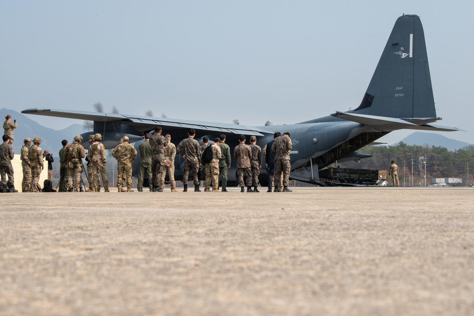 Photo of Airmen, Aircraft, operating on an alternate landing strip