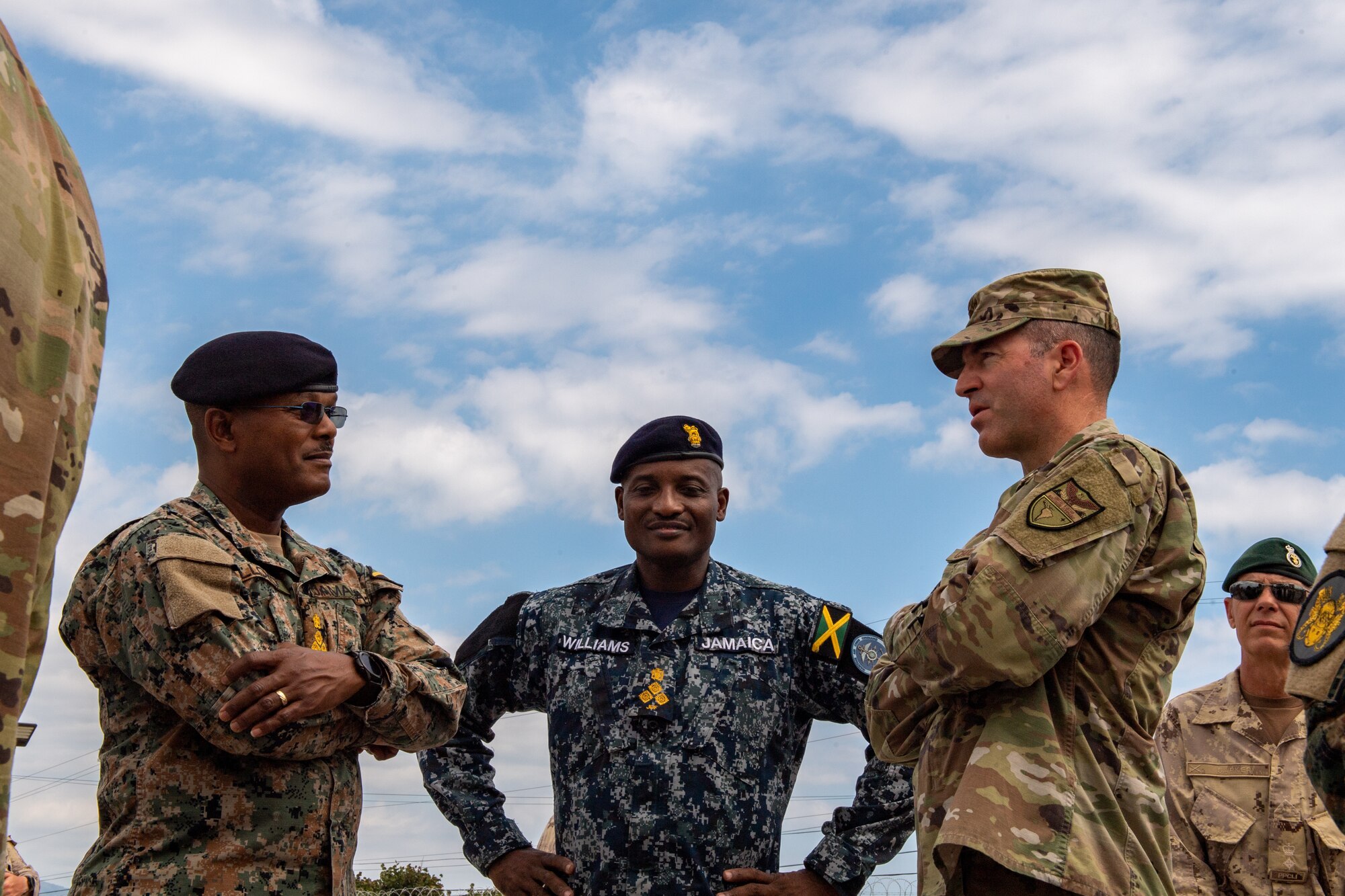 A photo of Airmen talking.