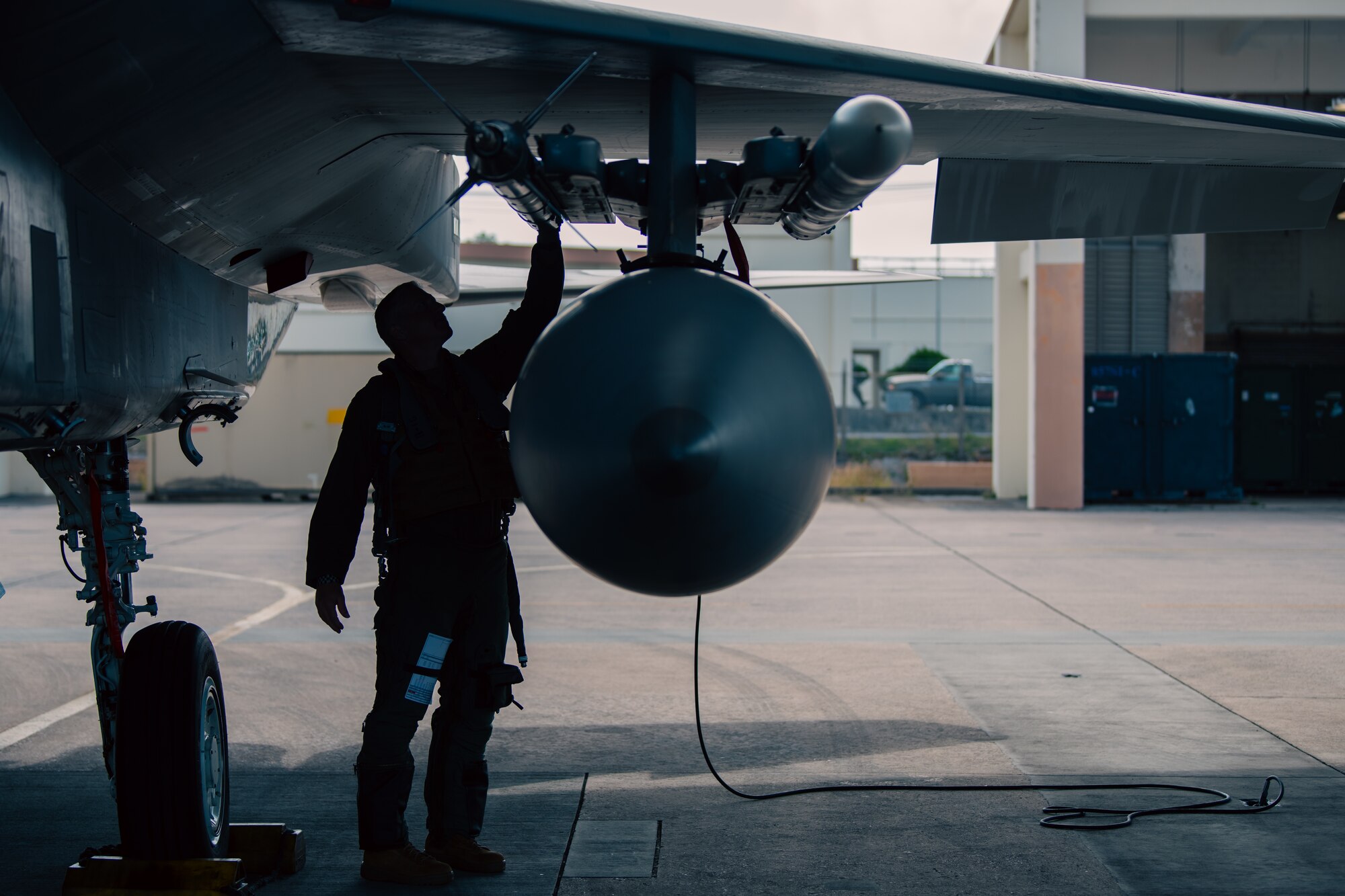 Airman inspects F15