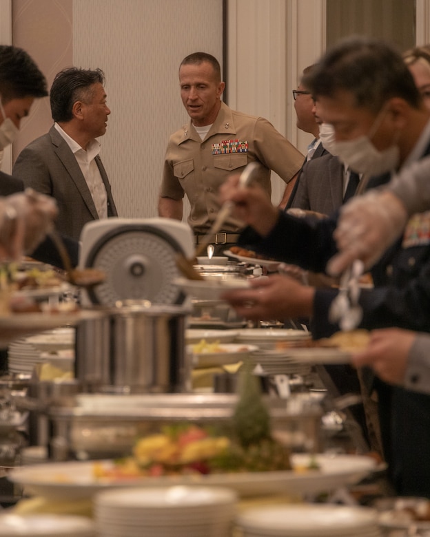 U.S. Marine Corps Maj. Gen. Stephen Liszewski, the commanding general of Marine Corps Installations Pacific, speaks with entrepreneurs during an American Chamber of Commerce in Okinawa meeting at the Laguna Garden Hotel in Ginowan, Okinawa, Japan, March 3, 2023. The conference was organized to help promote business between the U.S. military and Japanese entrepreneurs with ACCO. ACCO was established in 1953 to unite business growth and American success among affiliates. Fields commonly joined with ACCO are manufacturing, retail, construction, wholesale, and financial services. (U.S. Marine Corps photo by Lance Cpl. Jonathan Beauchamp)