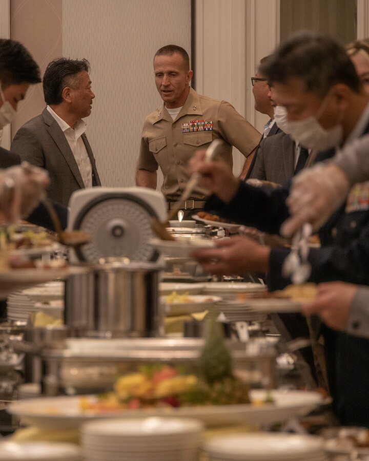 U.S. Marine Corps Maj. Gen. Stephen Liszewski, the commanding general of Marine Corps Installations Pacific, speaks with entrepreneurs during an American Chamber of Commerce in Okinawa meeting at the Laguna Garden Hotel in Ginowan, Okinawa, Japan, March 3, 2023. The conference was organized to help promote business between the U.S. military and Japanese entrepreneurs with ACCO. ACCO was established in 1953 to unite business growth and American success among affiliates. Fields commonly joined with ACCO are manufacturing, retail, construction, wholesale, and financial services. (U.S. Marine Corps photo by Lance Cpl. Jonathan Beauchamp)