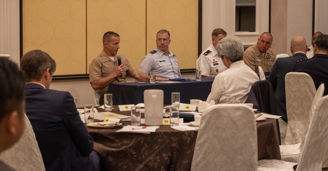U.S. Marine Corps Maj. Gen. Stephen Liszewski, the commanding general of Marine Corps Installations Pacific, answers questions during an American Chamber of Commerce in Okinawa meeting at Ginowan, Okinawa, Japan, March 3, 2023. The conference was organized to help promote business between the U.S. military and Japanese entrepreneurs with ACCO. ACCO was established in 1953 to unite business growth and American success among affiliates. Fields commonly joined with ACCO are manufacturing, retail, construction, wholesale, and financial services. (U.S. Marine Corps photo by Lance Cpl. Jonathan Beauchamp)