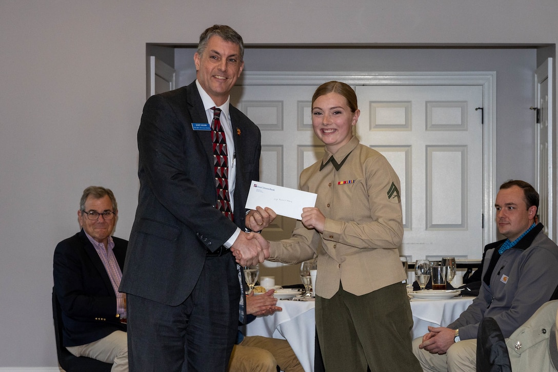 The Service Person of the Quarter ceremony honored Cpl. Rachael Alboucq for her volunteer service on Marine Corps Air Station Cherry Point and in the surrounding community.