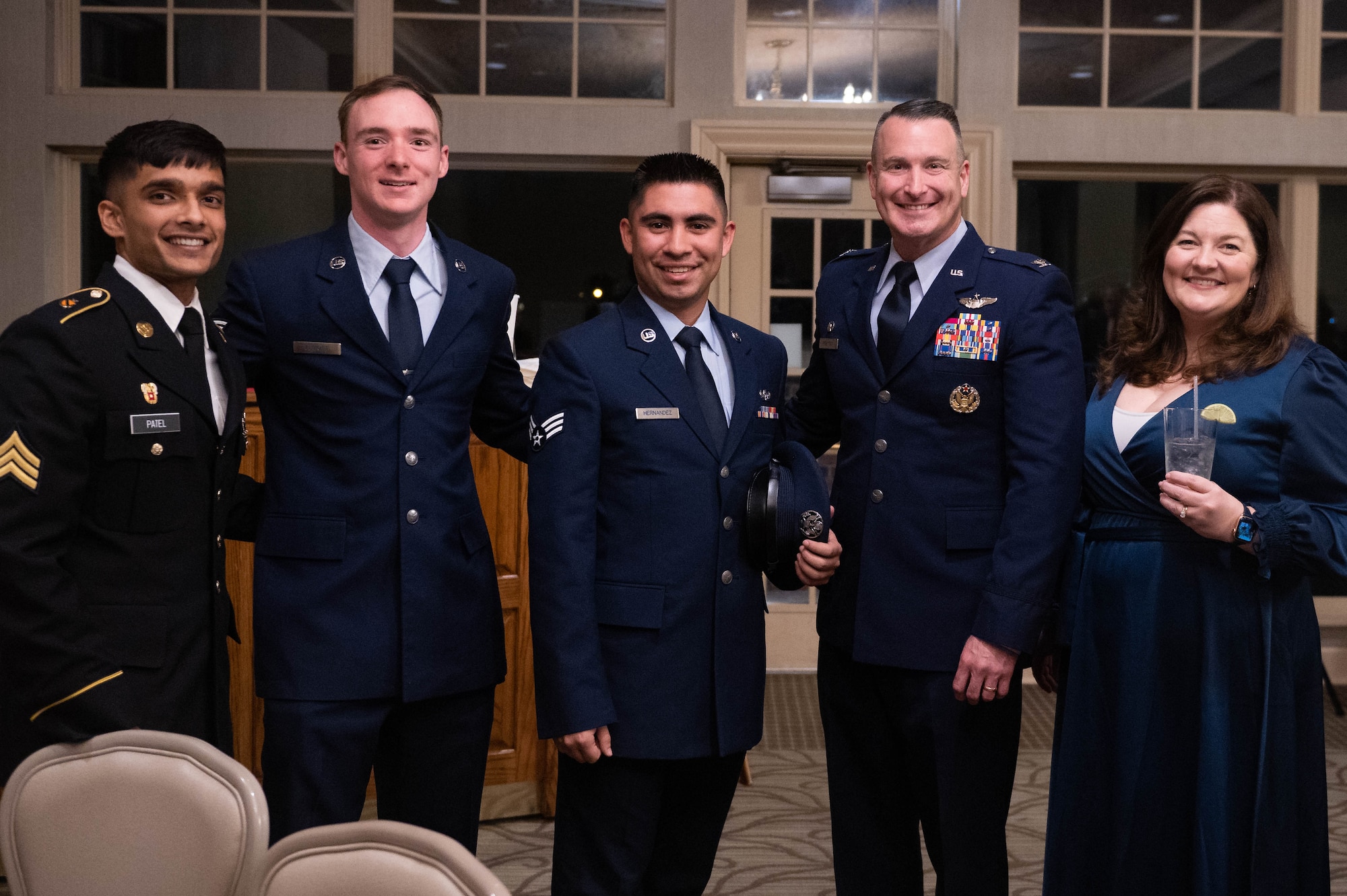 Military members pose for photo