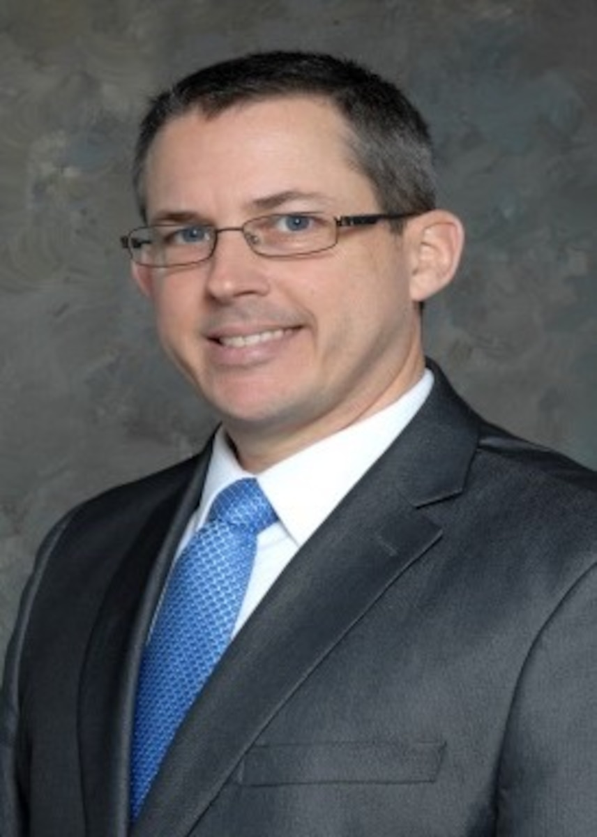 Mr. Gregory J. Simer