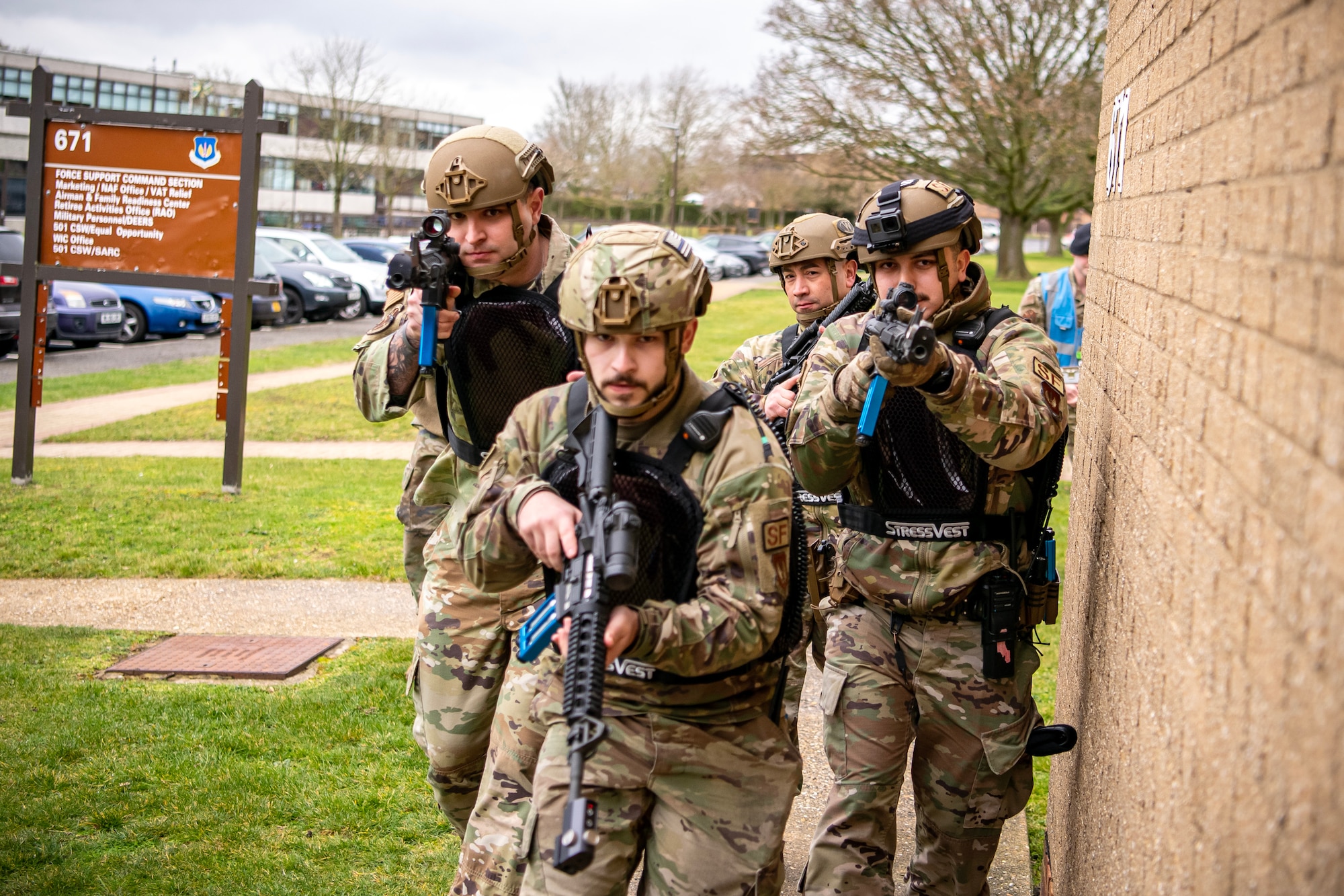 Airmen from the 423d Security Forces Squadron, perform a building sweep during an active shooter exercise at RAF Alconbury, England, March 16, 2023. The exercise tested the 501st Combat Support Wing on overall readiness and ability to respond to an emergency situation. (U.S. Air Force photo by Staff Sgt. Eugene Oliver)