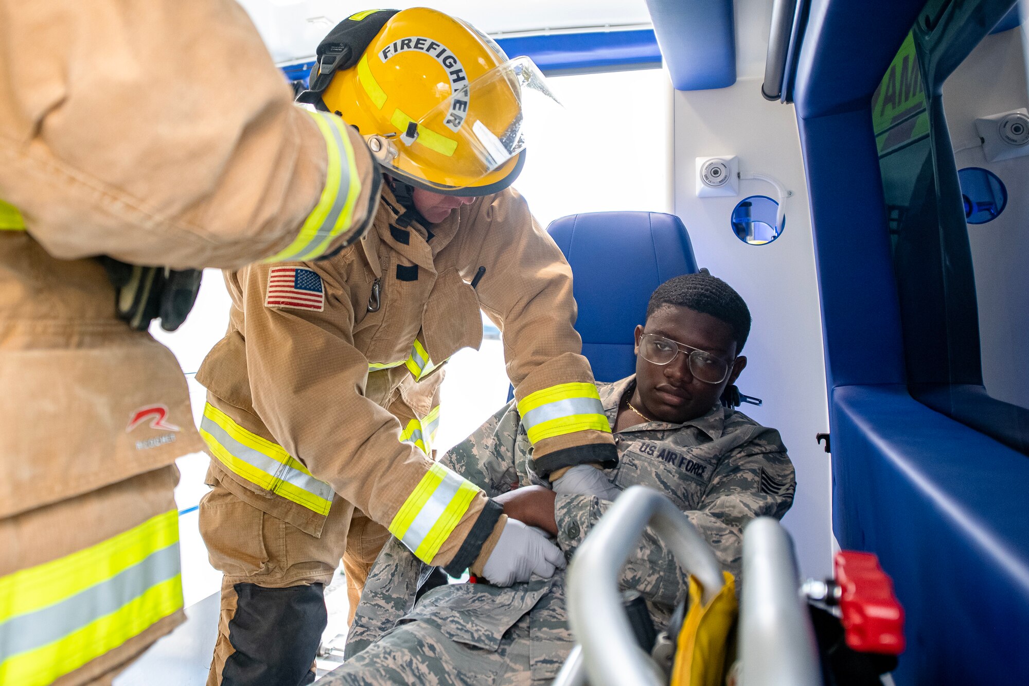 A Firefighter from the 423d Civil Engineer Squadron utilizes tactical combat casualty care on a simulated victim during an active shooter exercise at RAF Alconbury, England, March 16, 2023. The exercise tested the 501st Combat Support Wing on overall readiness and ability to respond to an emergency situation. (U.S. Air Force photo by Staff Sgt. Eugene Oliver)