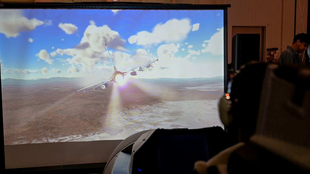 A student flies an aircraft in a flight simulator during the Aerospace Valley Career Festival, 10 March.