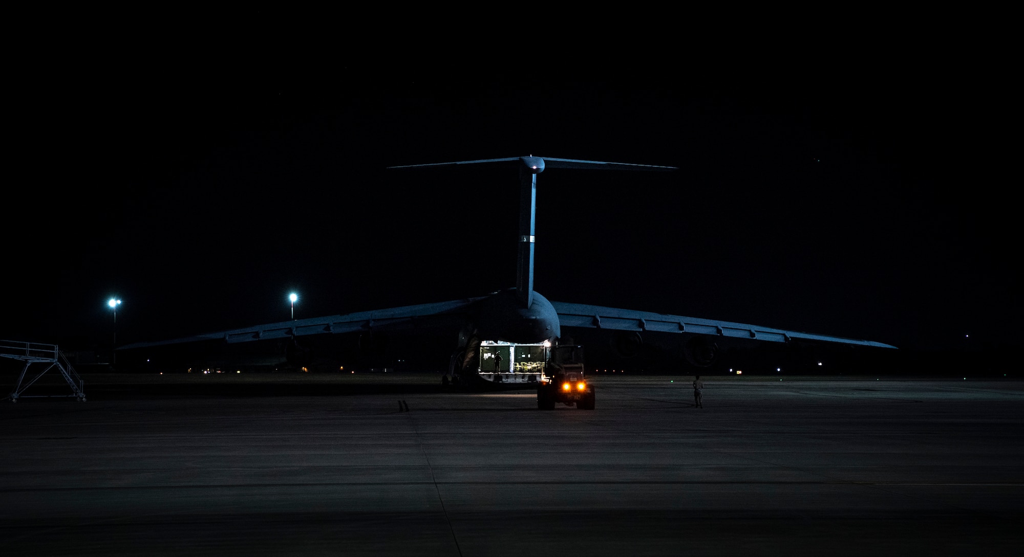 Airmen assigned to the 621st Contingency Response Wing  offload cargo for AGILE FLAG 23-1 at Savannah Air National Guard Base, Georgia, Feb. 26 2023.