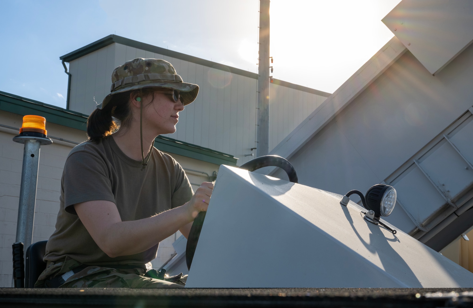 Senior Airman Jayana Basden, a 921st Contingency Response Squadron aerial port mobility team member, waits to unload inbound aircraft for AGILE FLAG 23-1 at Savannah Air National Guard Base, Georgia, Feb. 28. 2023.