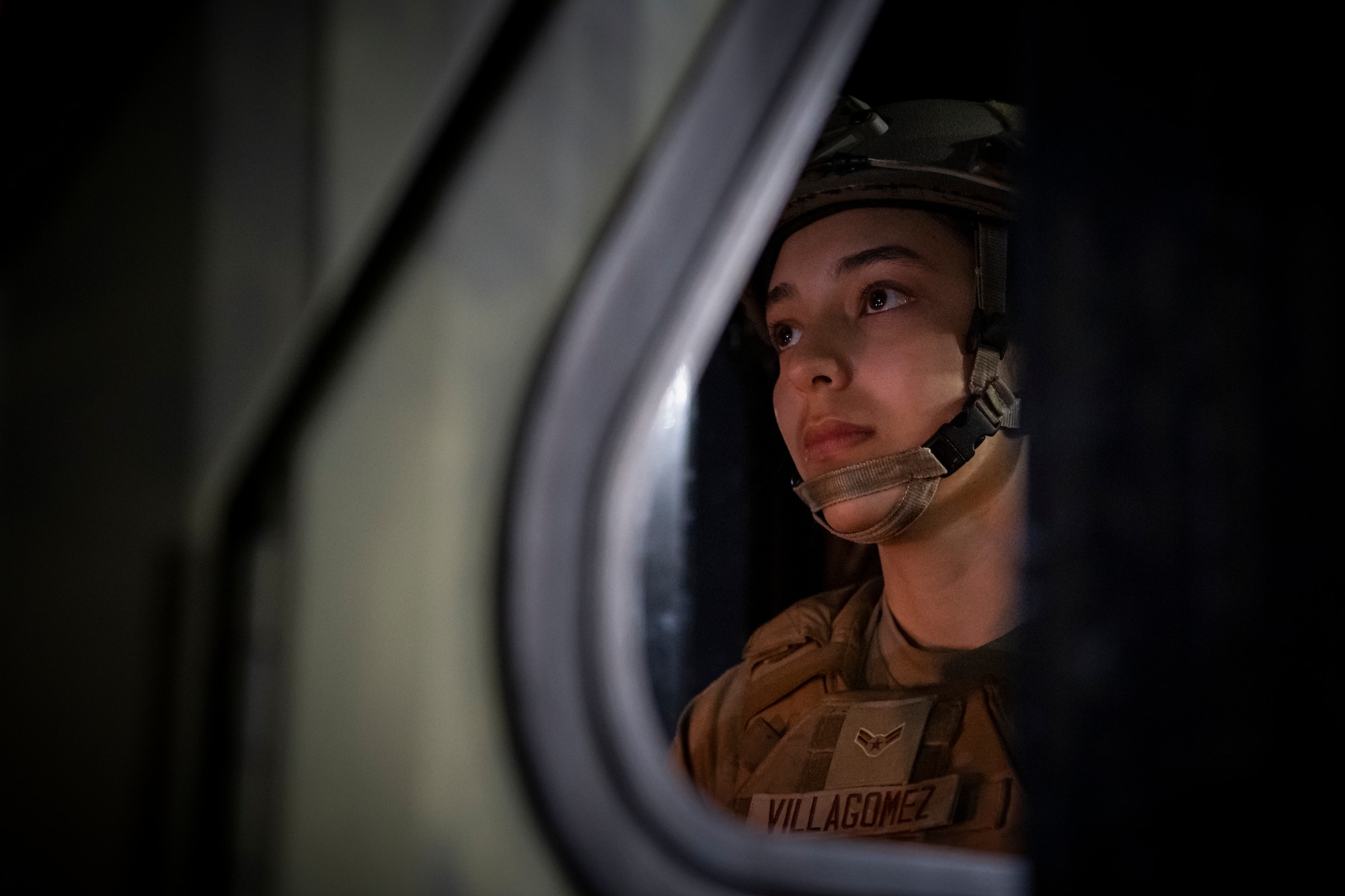 Airman 1st Class Briahna Villagomez, a 921st Contingency Response Squadron aerial port mobility team member, awaits to unload a Lockheed C-130 Hercules aircraft during AGILE FLAG 23-1 at Savannah Air National Guard Base, Georgia, Feb. 28. 2023.