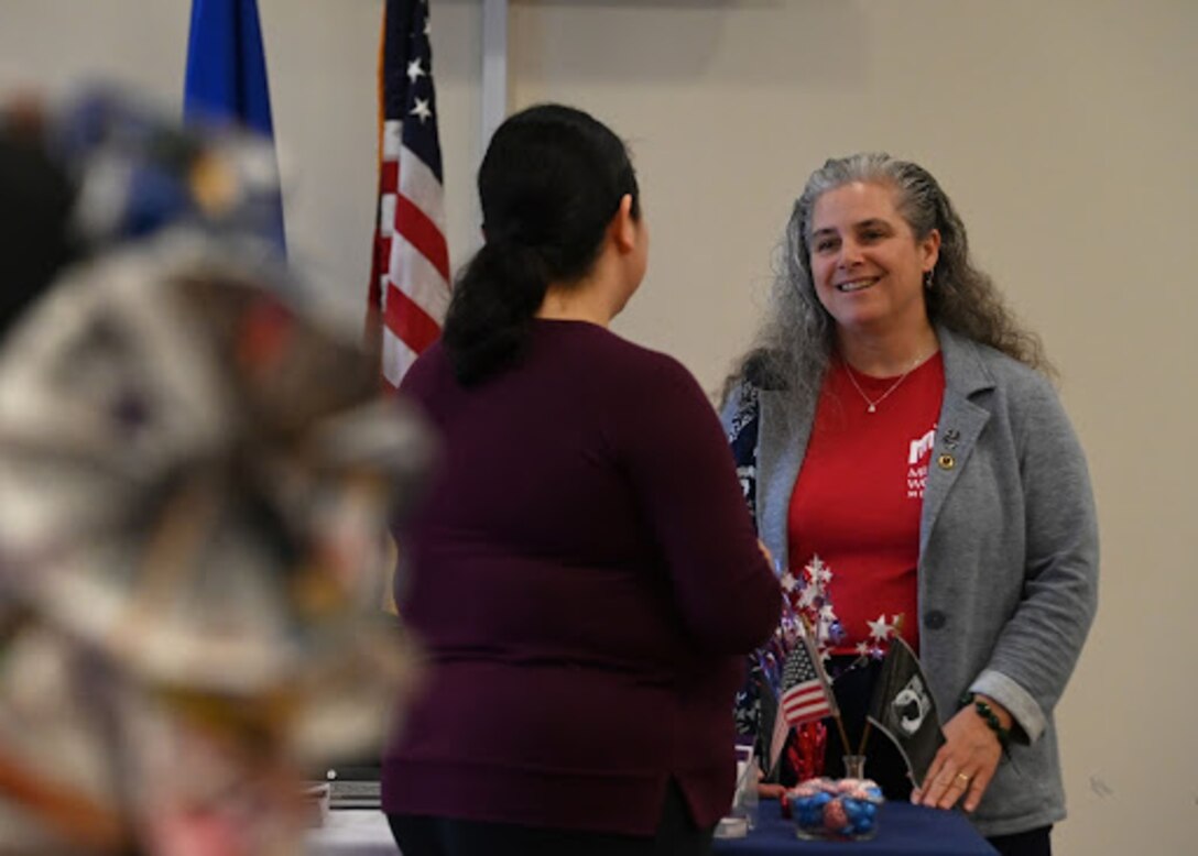 Attendees speak together during the Women’s History Month event at Joint Base Andrews, Md., March 17, 2023. The event featured multiple guest speakers, a women’s mentorship panel and booths from multiple helping agencies on base. (U.S. Air Force photo by Airman 1st Class Austin Pate)