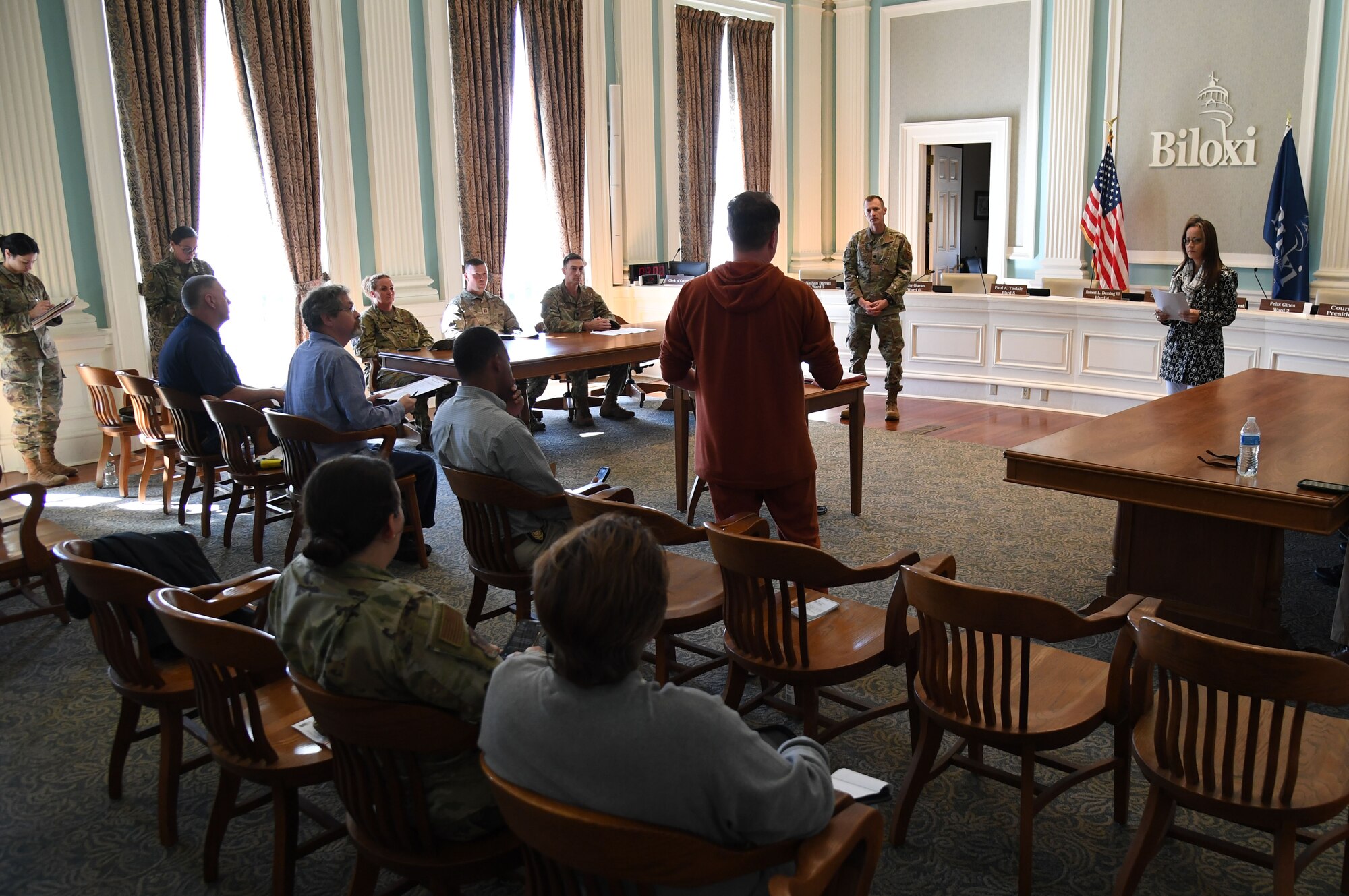 Keesler Air Force Base personnel participate in a mock press conference inside Biloxi City Hall during the aircraft mishap exercise at Keesler Air Force Base, Mississippi, March 16, 2023.