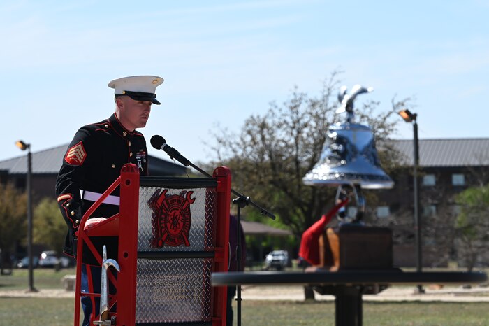 U.S. Marine Corps Sgt. Nicholas Spitzer, 312th Training Squadron instructor, speaks during the annual Department of Defense Fallen Firefighter Memorial Service, Goodfellow Air Force Base, Texas, March 17, 2023. Since 1993, the Louis F. Garland DOD Fire Academy has graduated more than 60,000 students from basic and advanced fire training courses. (U.S. Air Force photo by Senior Airman Ashley Thrash)