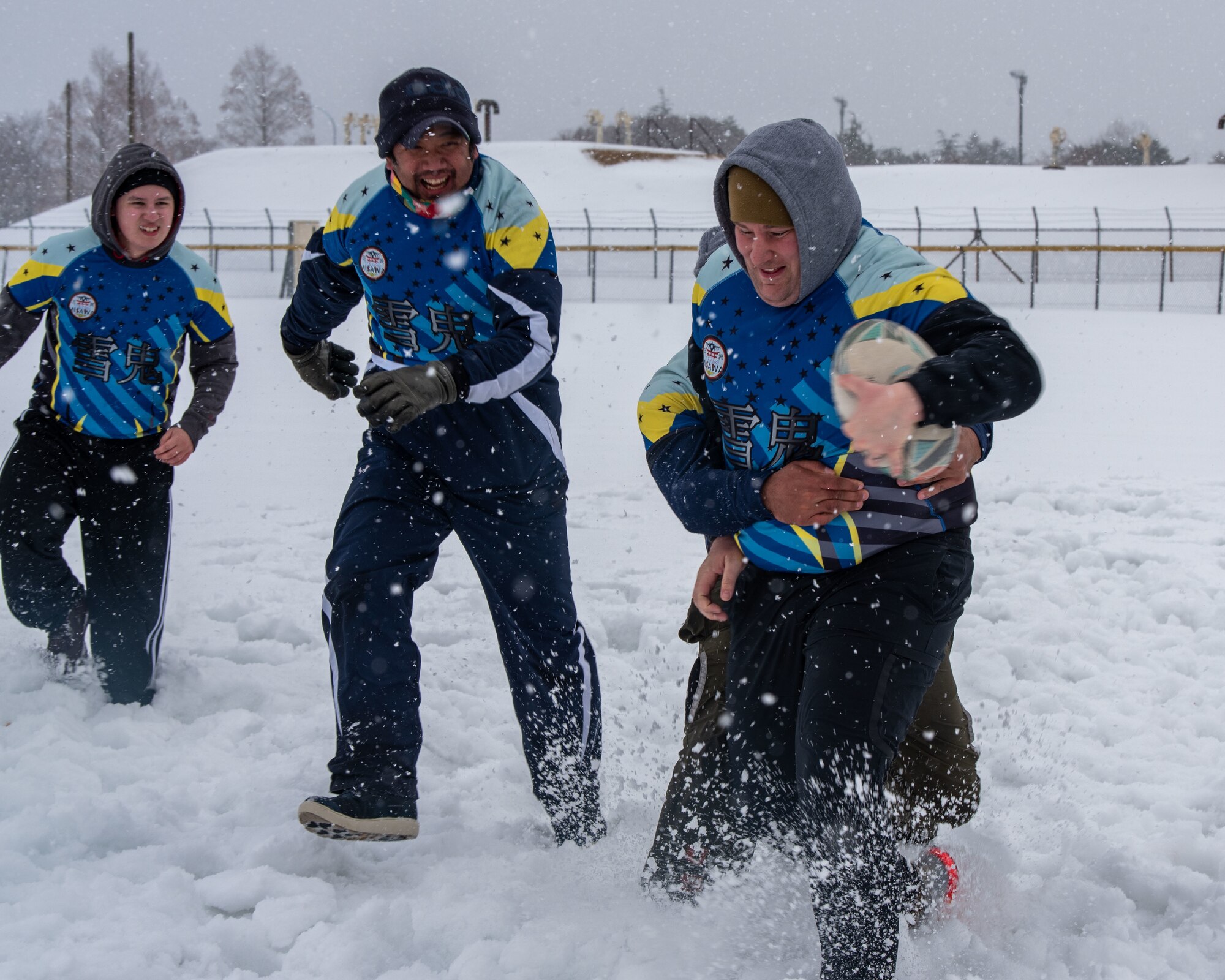A member of Misawa rugby team gets tackled