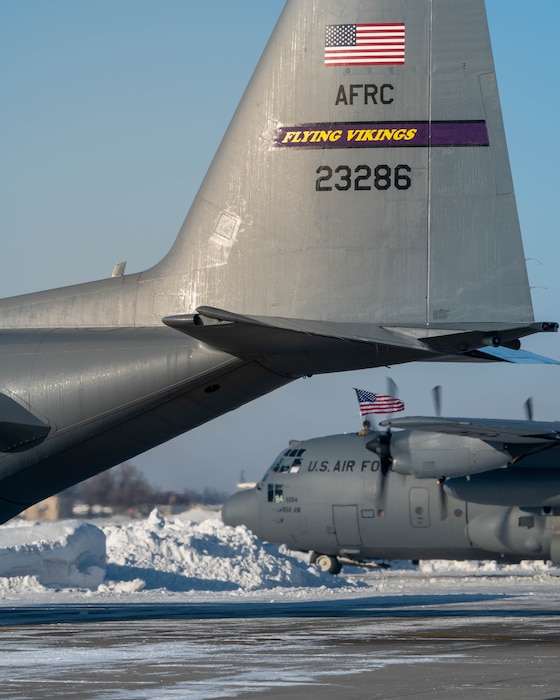 934th Airlift Wing's C-130s prepare to take off at Minneapolis-St. Paul Air Reserve Station on Feb. 25, 2023. More than 135 Airmen recently deployed to support Operation East Africa Counter-Terrorism's mission to conduct operations to enhance partner nation capacity, promote regional peace and stability, dissuade conflict, and protect U.S. and coalition interests. (U.S. Air Force photo by Master Sgt. Trevor Saylor)