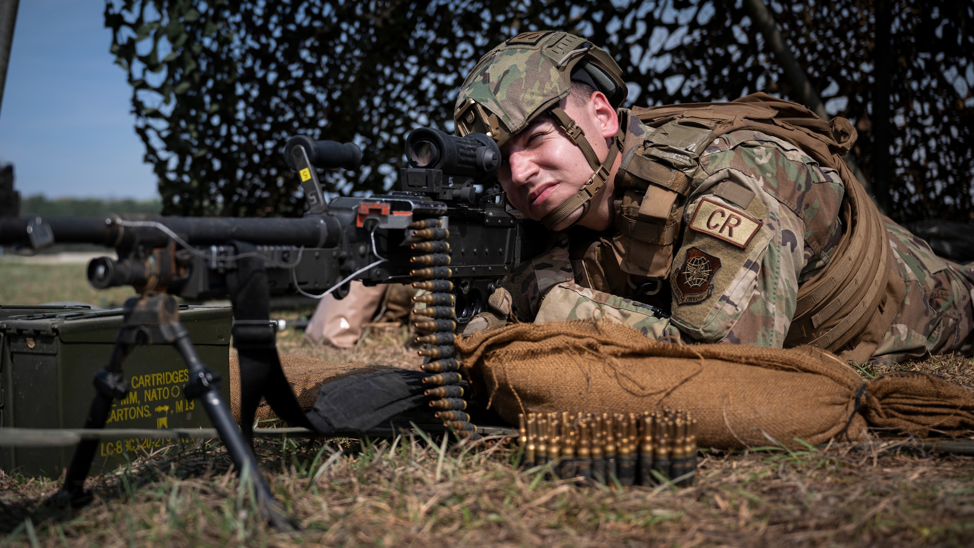 Senior Airman Kolby Karim, a 921st Contingency Response Squadron fire team member, surveys the perimeter at a forward operatin site during AGILE FLAG 23-1 at Hunter Army Airfield, Georgia, March 3, 2023
