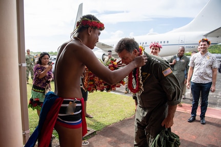 COLONIA, Yap, Federated States of Micronesia  (March 17, 2023) Adm. John C. Aquilino, Commander U.S. Indo-Pacific Command, receives a nunuw, a distinctive garland from Yap, upon his arrival there. USINDOPACOM is committed to enhancing stability in the Asia-Pacific region by promoting security cooperation, encouraging peaceful development, responding to contingencies, deterring aggression and, when necessary, fighting to win. (U.S. Navy photo by Chief Mass Communication Specialist Shannon M. Smith)