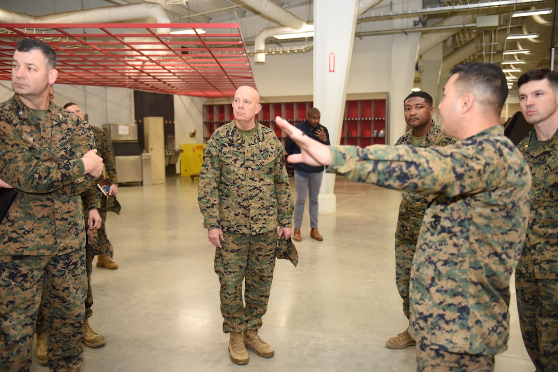 MSgt John Esguerra provides information on Detachment training equipment to the CMC.