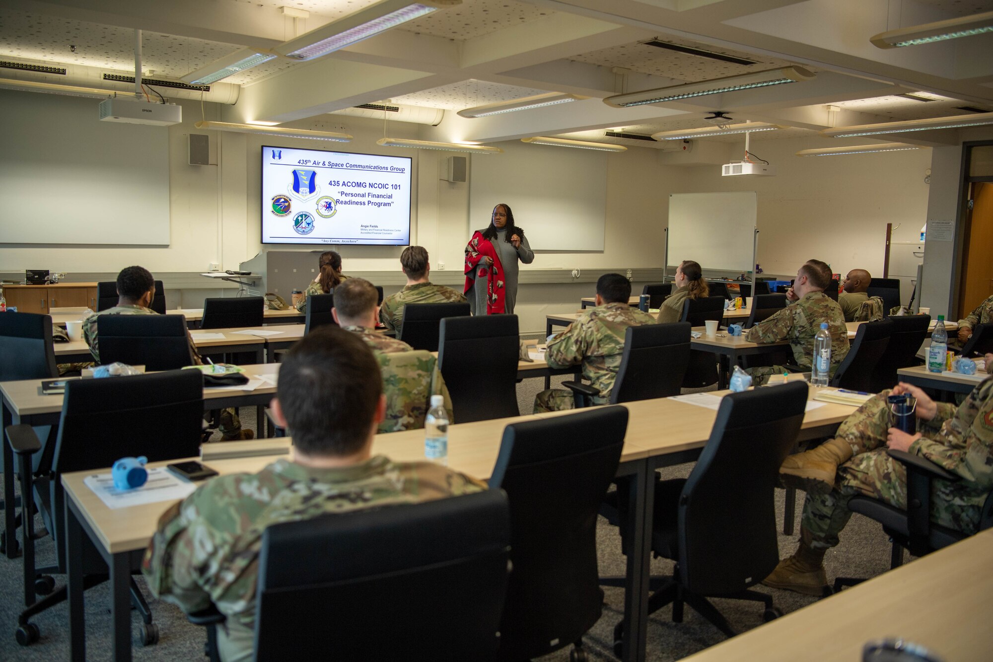 Angie Field, 86th Force Support Squadron, Military and Family Readiness Center community readiness consultant and personal financial manager, leads a personal financial readiness class at Ramstein Air Base, Germany, March 15, 2023
