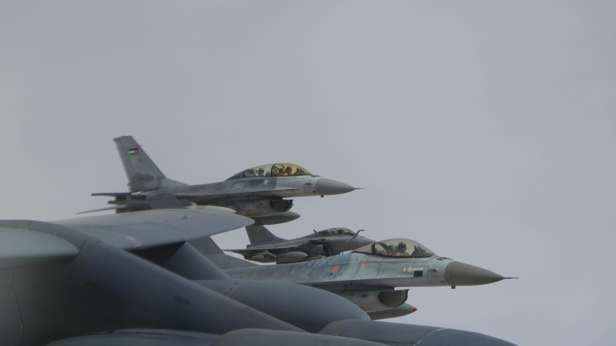 Two Jordanian Air Force F-15s and an Italian Air Force A-11 Ghibli fly in formation with a B-52H Stratofortress assigned to the 23rd Expeditionary Bomb Squadron in the Central Command area of responsibility March 12, 2023. These Bomber Task Force missions are representative of the U.S. extended deterrent commitment to our Allies and Partners and enhance regional security. (U.S. Air Force courtesy photo)