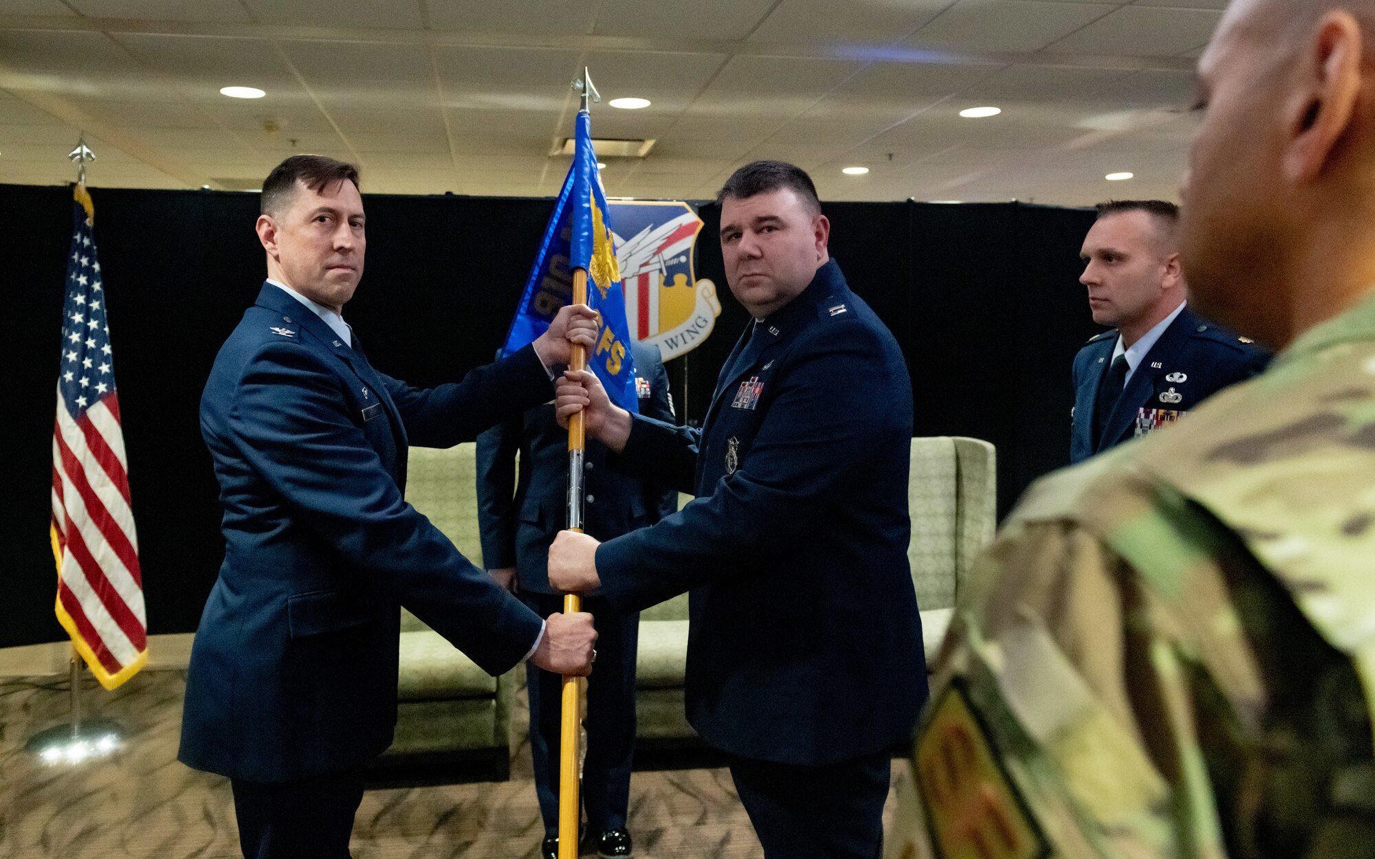 Capt. Robert Reader, the incoming commander of the 910th Security Forces Squadron, takes command from Col. Gregory Meyer, commander of the 910th Mission Support Group, Feb. 4, 2023, at the unit’s change of command ceremony at Youngstown Air Reserve Station, Ohio.