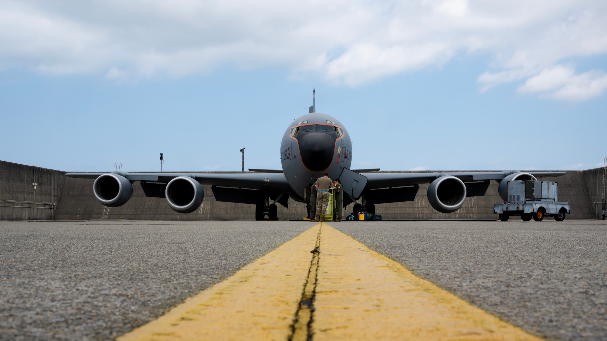 A U.S. Air Force KC-135 Stratotanker assigned to the 909th Air Refueling Squadron is parked on the flightline prior to a refueling mission at Kadena Air Base, Japan, March 19, 2023. The KC-135 Stratotanker provides the core aerial refueling capability for the Department of Defense, supporting the U.S. Navy, U.S. Marine Corps, and allied nation aircraft. (U.S. Air Force photo by Senior Airman Jessi Roth)