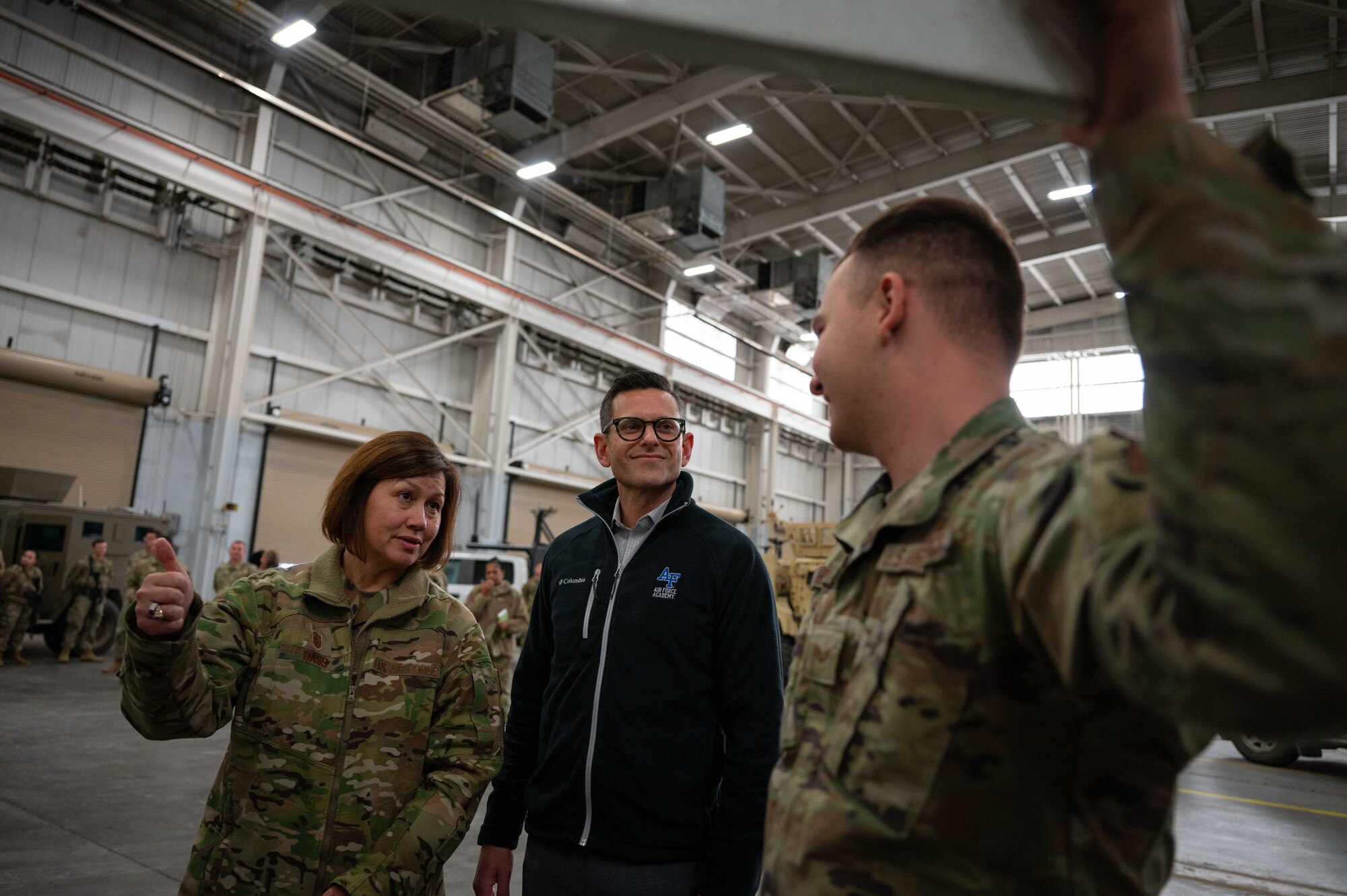 Chief Master Sgt. of the Air Force JoAnne Bass interacts with Airmen.