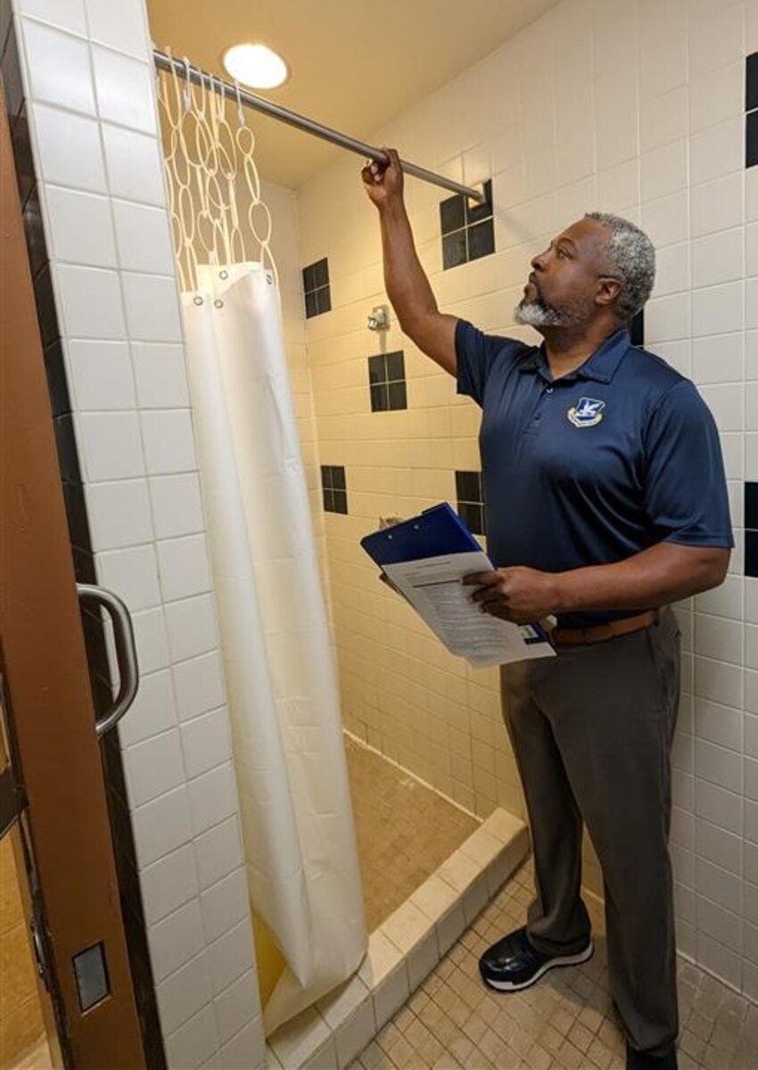 Checks a shower curtain rod