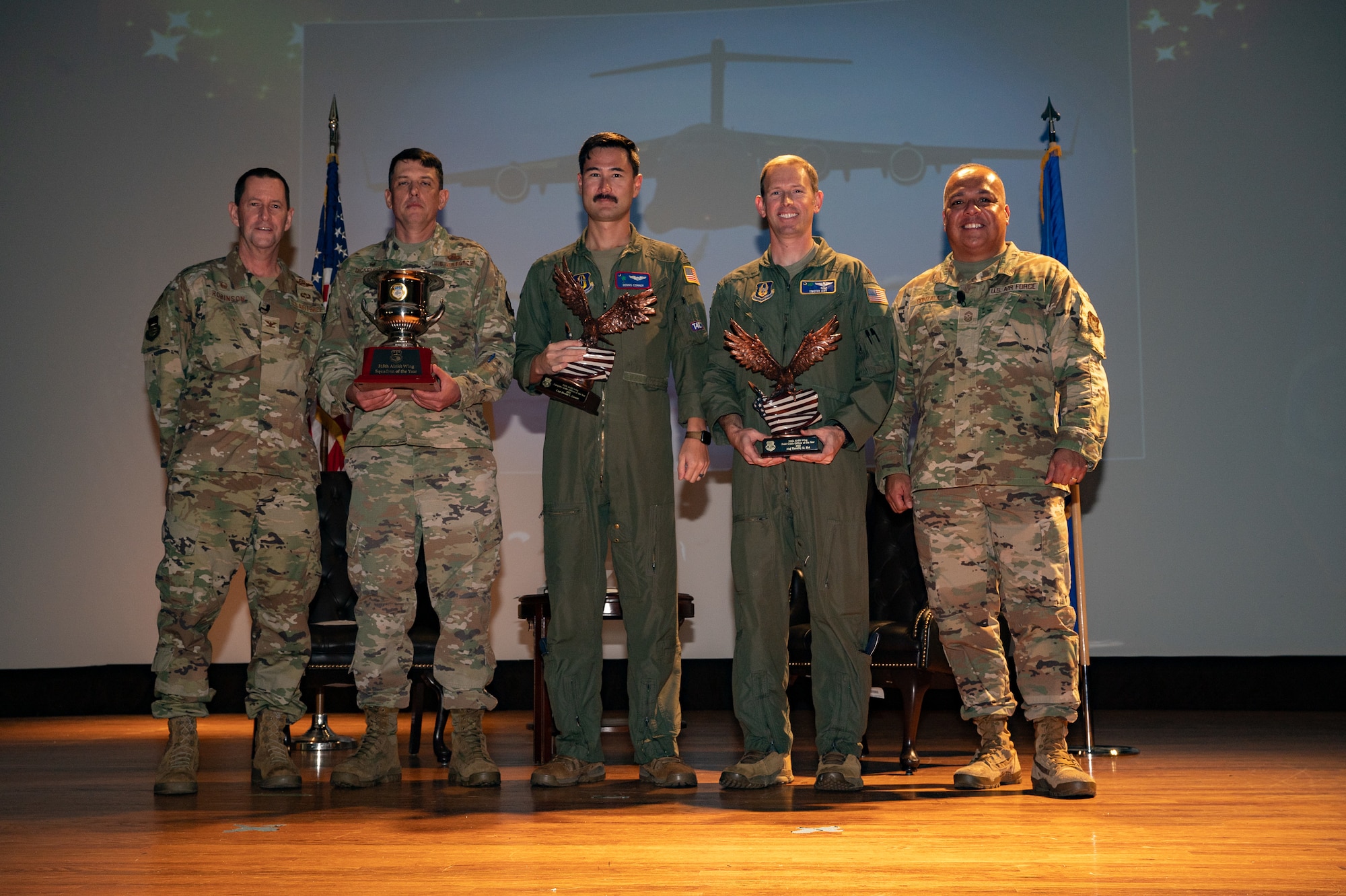 The 315th Airlift Wing hosted its annual awards ceremony to highlight the accomplishments of the wing and its members, March 18, 2023, at Joint Base Charleston, South Carolina. Col. John Robinson, 315 AW commander, and Chief Master Sgt. Joe Gonzalez, 315 AW command chief, hosted the ceremony to recognize and award exceptional Airmen for their 2022 performance and celebrate the 315 AW’s achievement of receiving the distinguished Raincross Trophy from the Fourth Air Force, headquartered at March Air Reserve Base, California.