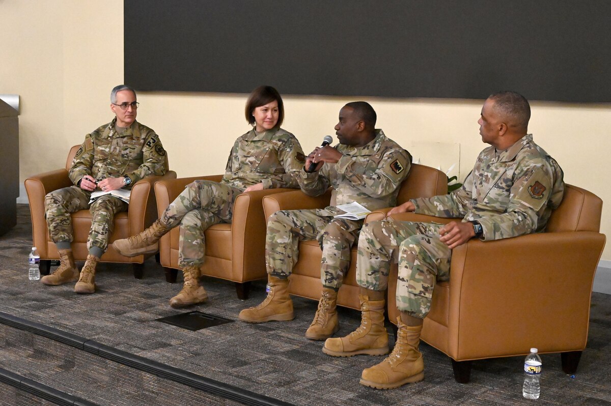 Senior Enlisted Advisor to the Chairman of the Joint Chiefs of Staff Ramon “CZ” Colon-Lopez, Chief Master Sgt. of the Air Force JoAnne S. Bass, Chief Master Sgt. Maurice L. Williams, Air National Guard command chief and Chief Master Sgt. Timothy C. White, Jr., senior enlisted leader to the chief of the Air Force Reserve and command chief, Air Force Reserve Command, field questions during the 2023 TFI Symposium at Joint Base Andrews, Md., March 14, 2023. The Air Force and Space Force senior enlisted leaders from the Reserve, Guard, and active-duty components spoke about TFI and the abilities of the Department of the Air Force to compete, deter, and win against current and future threats. (U.S. Air National Guard photo by Master Sgt. David Eichaker)