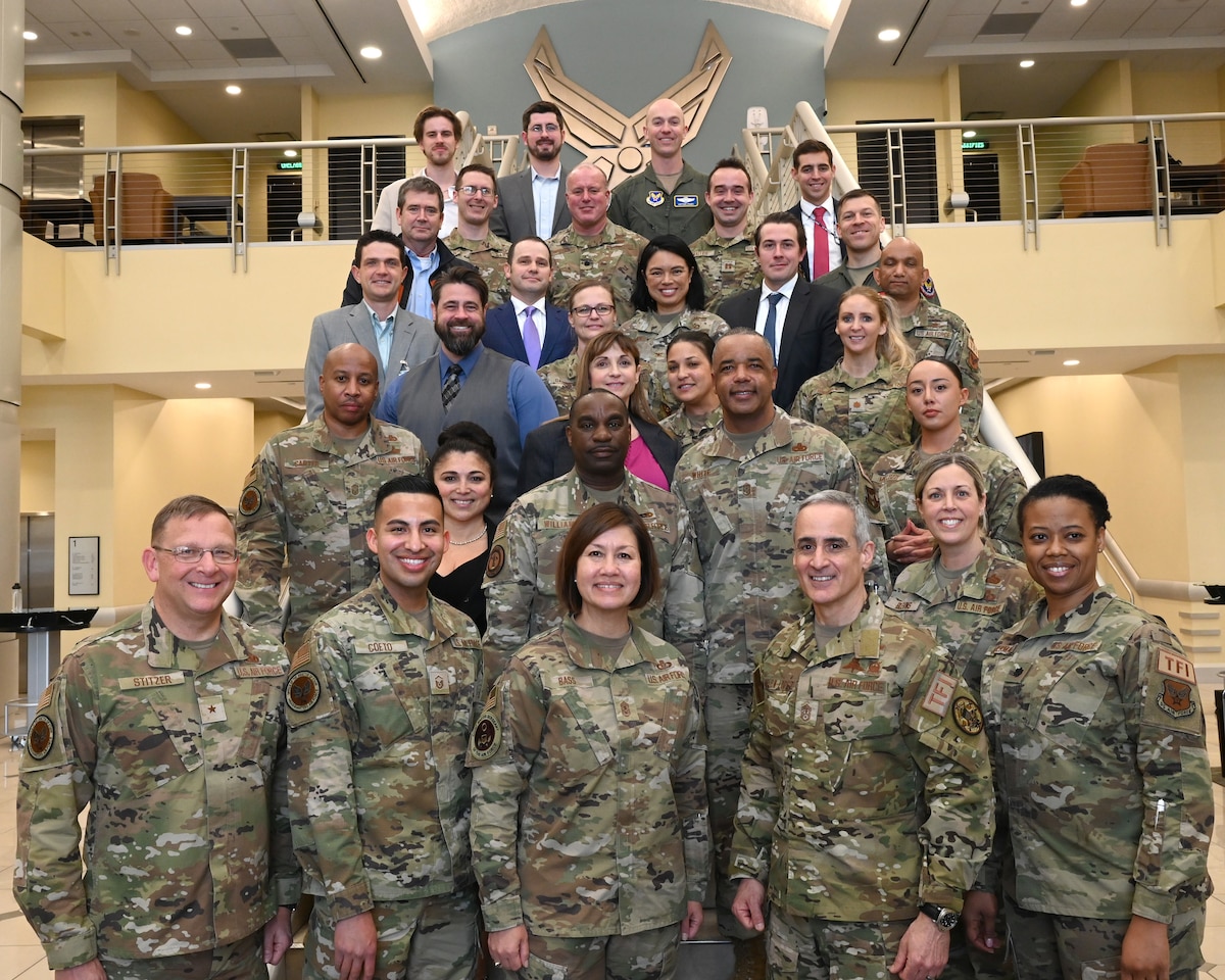 Department of the Air Force senior leaders pose with Total Force Integration staff during the 2023 TFI symposium at Joint Base Andrews, Md., March 14, 2023. The Air Force and Space Force leaders from the Reserve, Guard, and active-duty components spoke about TFI and the abilities of the DAF to compete, deter, and win against current and future threats. (U.S. Air National Guard photo by Master Sgt. David Eichaker)