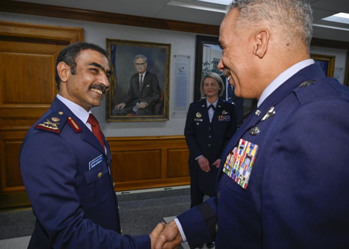 Qatar Emiri Air Force Commander Maj. Gen. Jassim Al-Mannai greets Brig. Gen. David Cochran, commander of the West Virginia Air National Guard, after a meeting at the Pentagon, Arlington, Va., March 16, 2023. As part of the visit, Al-Mannai received a full-honors arrival, was awarded a Legion of Merit at Joint Base Anacostia-Bolling, Washington, D.C. and attended both an office call with Brown and staff talks at the Pentagon. (U.S. Air Force photo by Eric Dietrich)