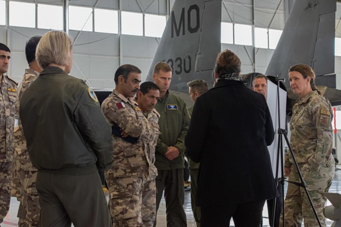 Qatar Emiri Air Force Commander Maj. Gen. Jassim Al-Mannai, Brig. Gen. Salah Mana Al-Jaal, Al Udeid Air Base commander, U.S. Air Force Brig. Gen. David Mineau, 15th Air Force vice commander and other senior officers are briefed about the planned beddown of a QEAF F-15QA training squadron at Mountain Home Air Force Base, Idaho, March 14, 2023. The QEAF hosts the largest U.S. Air Force presence in the U.S. Central Command area of responsibility. (U.S. Air Force photo by Airman 1st Class Krista Reed Choate)