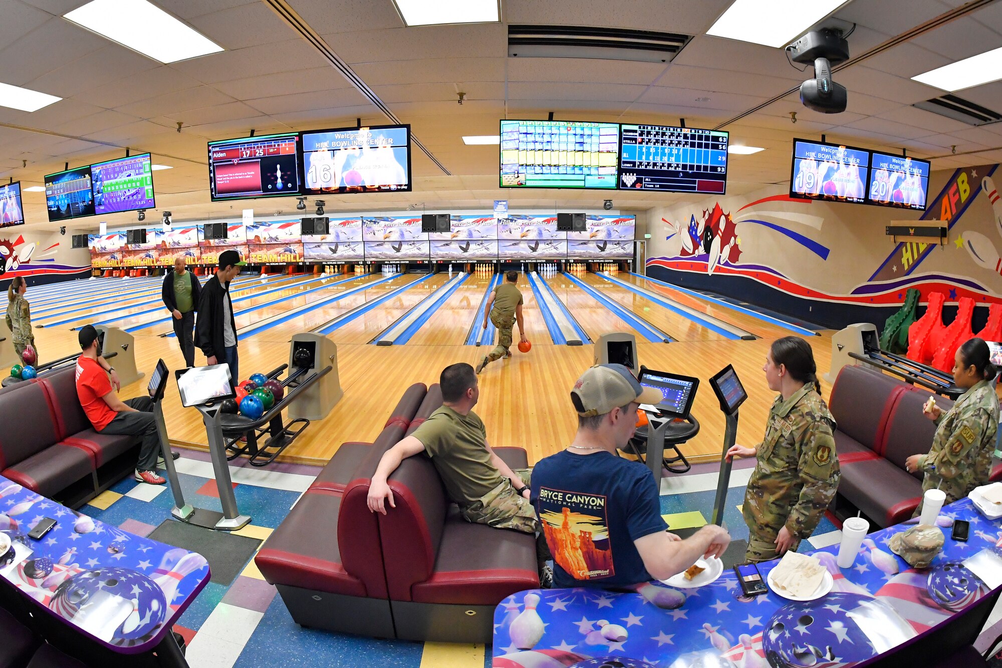 748th Supply Chain Management Group personnel enjoy a fun team building activity by bowling together March 17, 2023, at Hill Air Force Base, Utah. The activity was paid for by the Air Force Unite program, a resiliency-based program that assists leaders in providing opportunities for recreation and cohesive activities for their units. (U.S. Air Force photo by Todd Cromar)