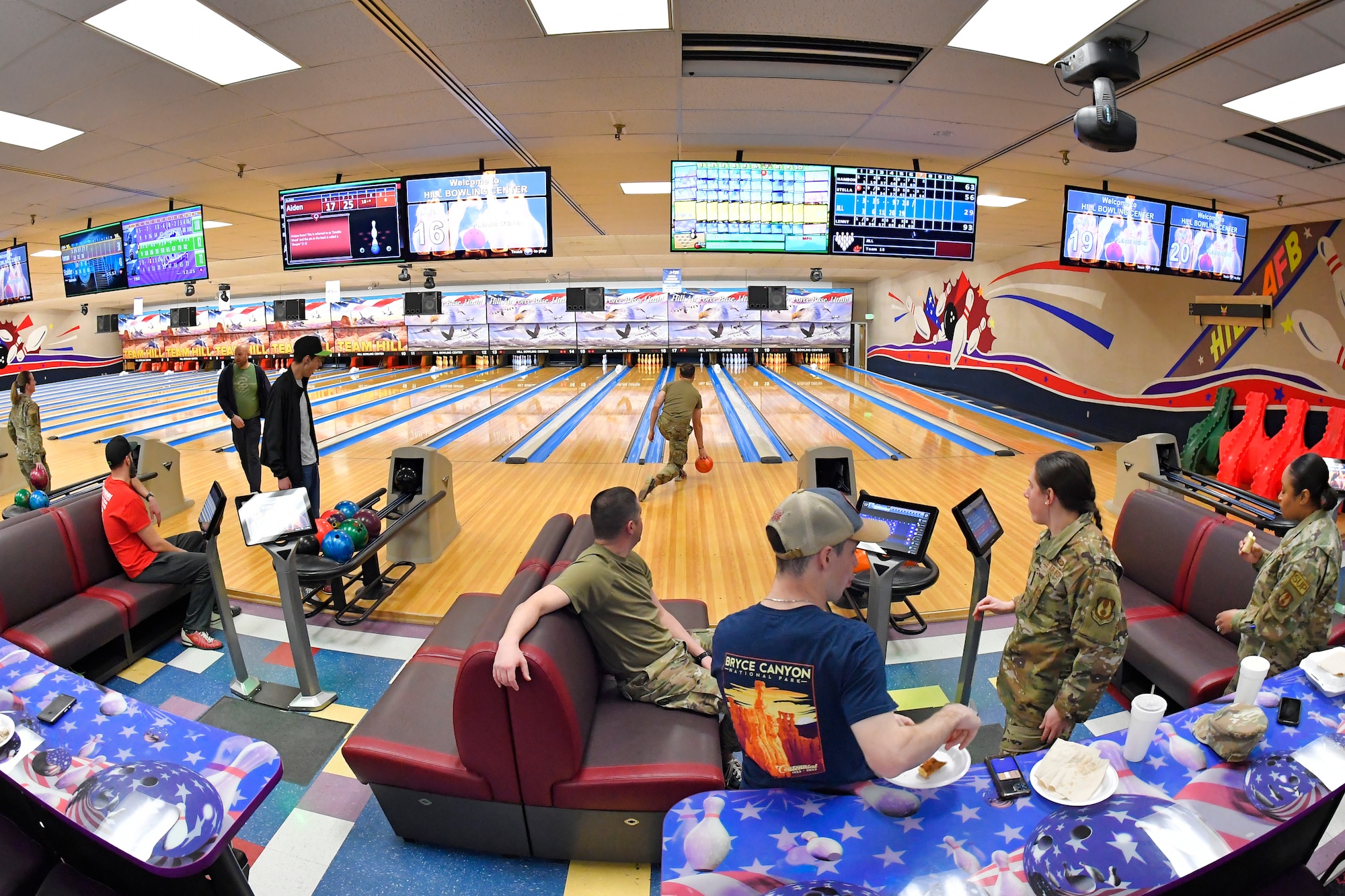 748th Supply Chain Management Group personnel enjoy a fun team building activity by bowling together March 17, 2023, at Hill Air Force Base, Utah. The activity was paid for by the Air Force Unite program, a resiliency-based program that assists leaders in providing opportunities for recreation and cohesive activities for their units. (U.S. Air Force photo by Todd Cromar)