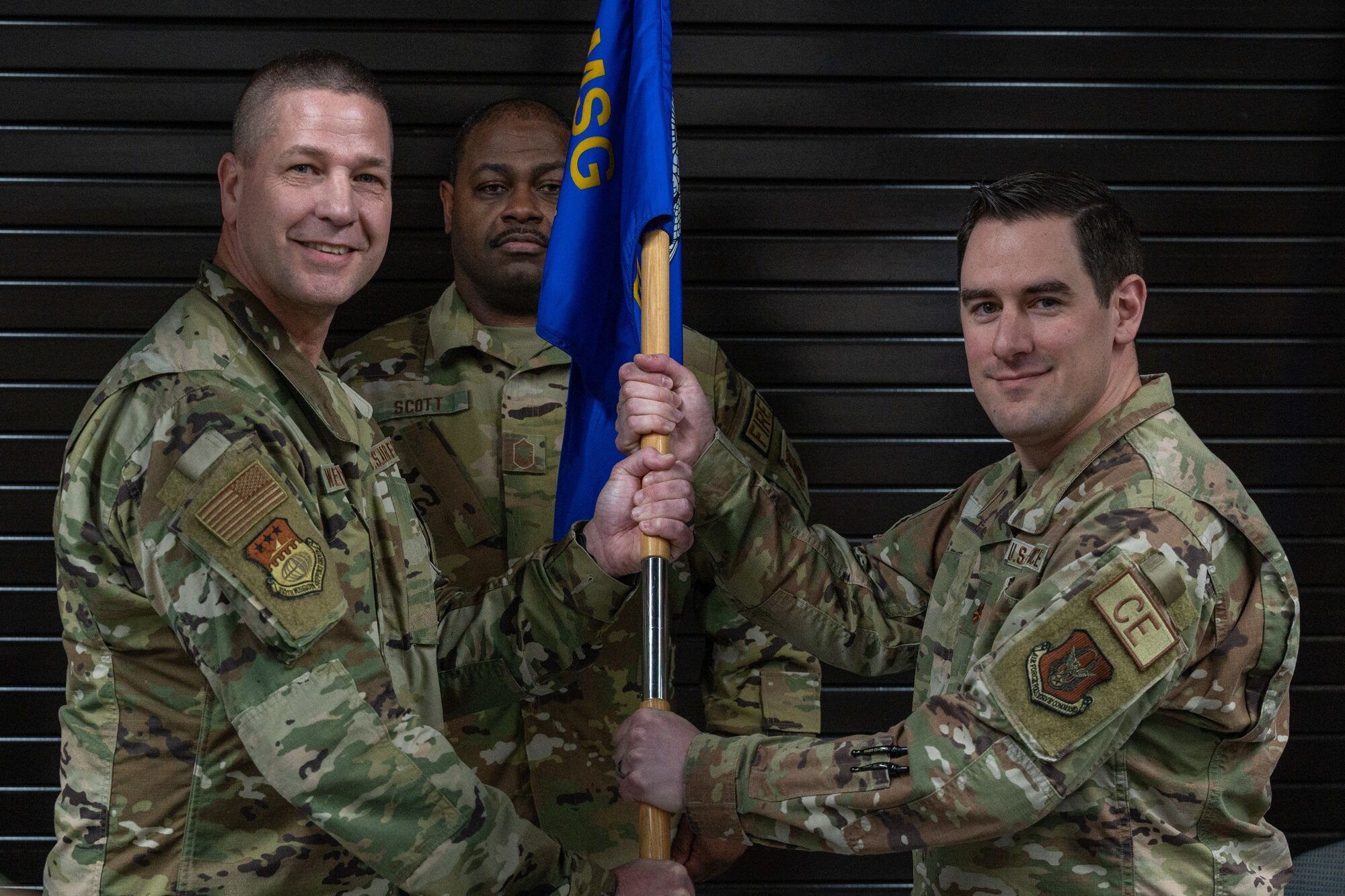 Lt. Col. Robert Wengerter, commander of the 315th Mission Support Group, and Maj. Andrew Folz, commander of the 315th Civil Engineer Flight stands for a change of command ceremony March 19, 2023 at Joint Base Charleston, South Carolina.