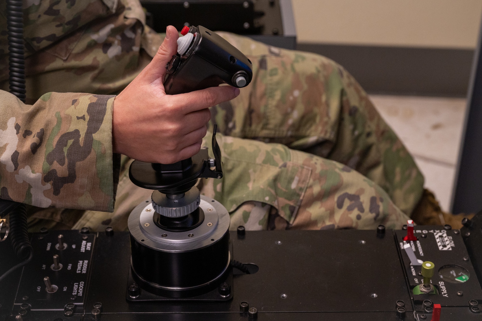 U.S. Air Force Master Sgt. Sarah Collins, Detachment 9 control and reporting center senior enlisted leader, utilizes a hypoxia flight trainer, Mar. 13, 2023, at Luke Air Force Base, Arizona.