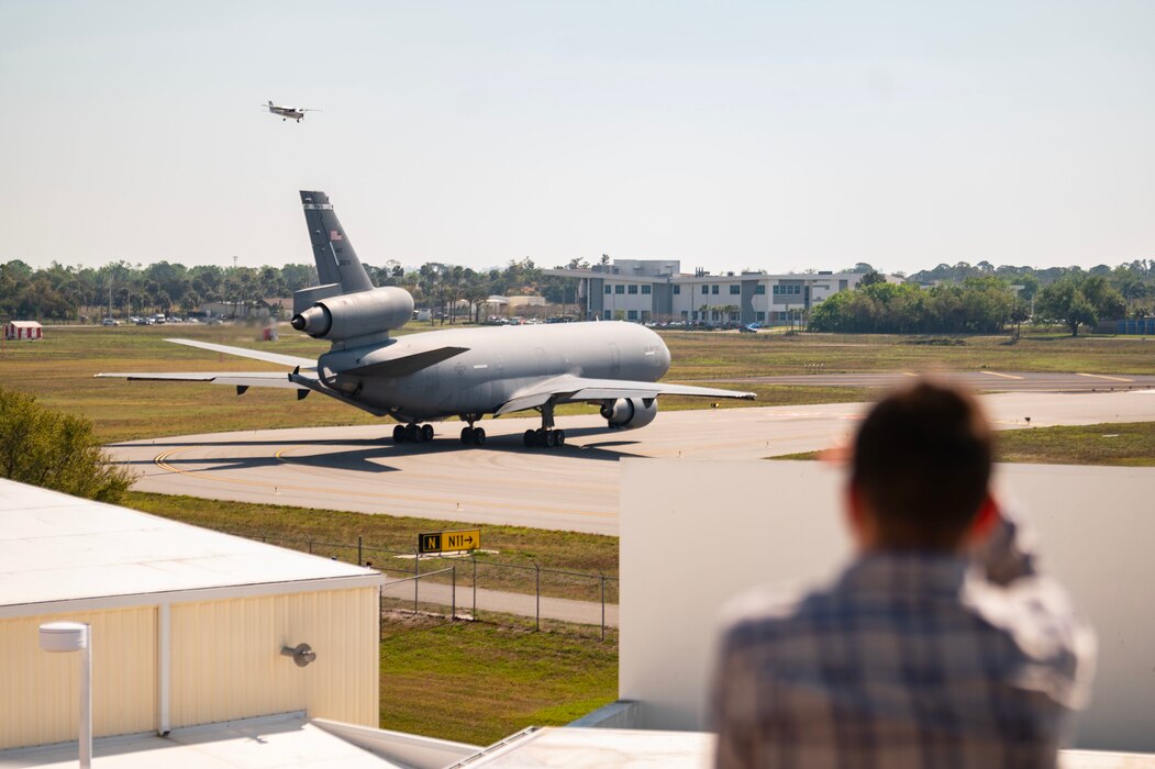Aiden Babiarz, Embry-Riddle Aeronautical University Reserve Officer Training Corps cadet, watches a KC-10 Extender taxi before take-off at Daytona Beach International Airport, Florida, March 2, 2023.