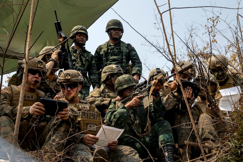 U.S. Marines with 1st Battalion, 7th Marines, U.S. Army Soldiers with 23 Brigade Engineer Battalion, and Royal Thai Army Soldiers with 21st Field Artillery Battalion observe the impact areas at a Combined Arms Live-Fire Exercise during Cobra Gold 23 at Lopburi Province, Kingdom of Thailand, March 10, 2023.