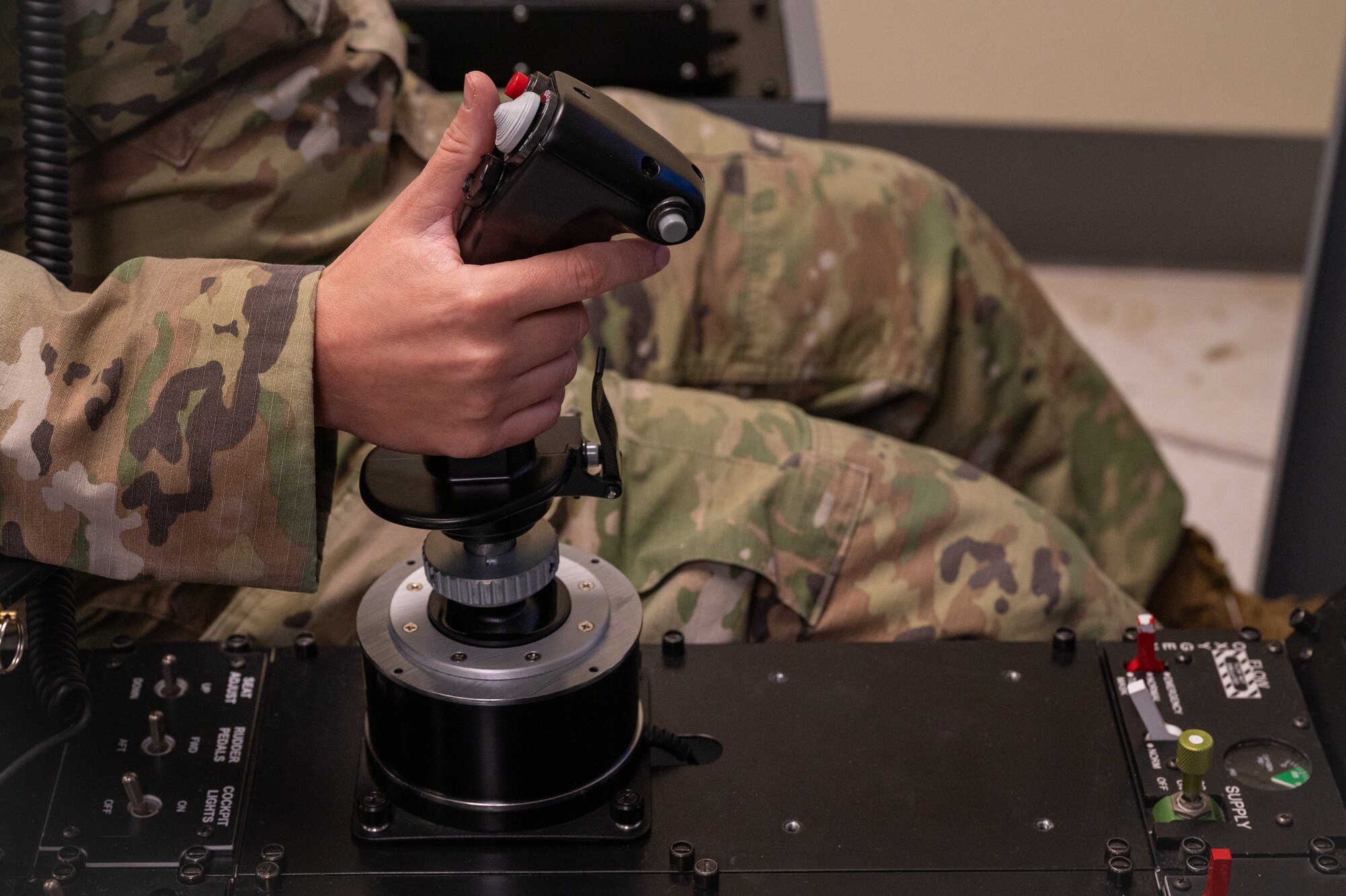 U.S. Air Force Master Sgt. Sarah Collins, Detachment 9 control and reporting center senior enlisted leader, utilizes a hypoxia flight trainer, Mar. 13, 2023, at Luke Air Force Base, Arizona.