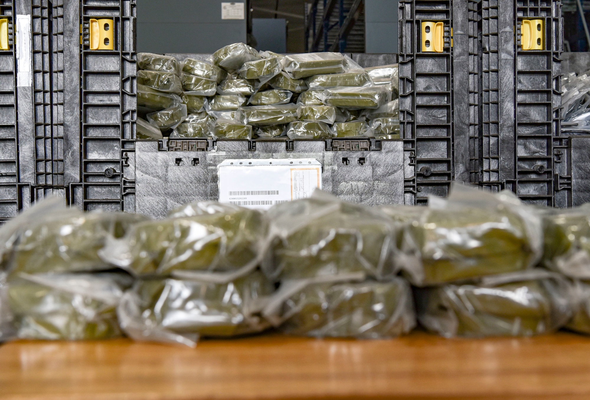 Airmen assigned to 15th Wing and 647th Air Base Group store, organize and distribute deployment equipment for wing and tenant unit assets at Joint Base Pearl Harbor-Hickam, Hawaii, during the Joint Base Readiness Exercise, Feb. 28, 2023. Annual exercises like the JBRE strengthen relationships and the interoperability between services through shared experiences and realistic training.  (U.S. Air Force photo by Tech. Sgt. Anthony Nelson Jr.)