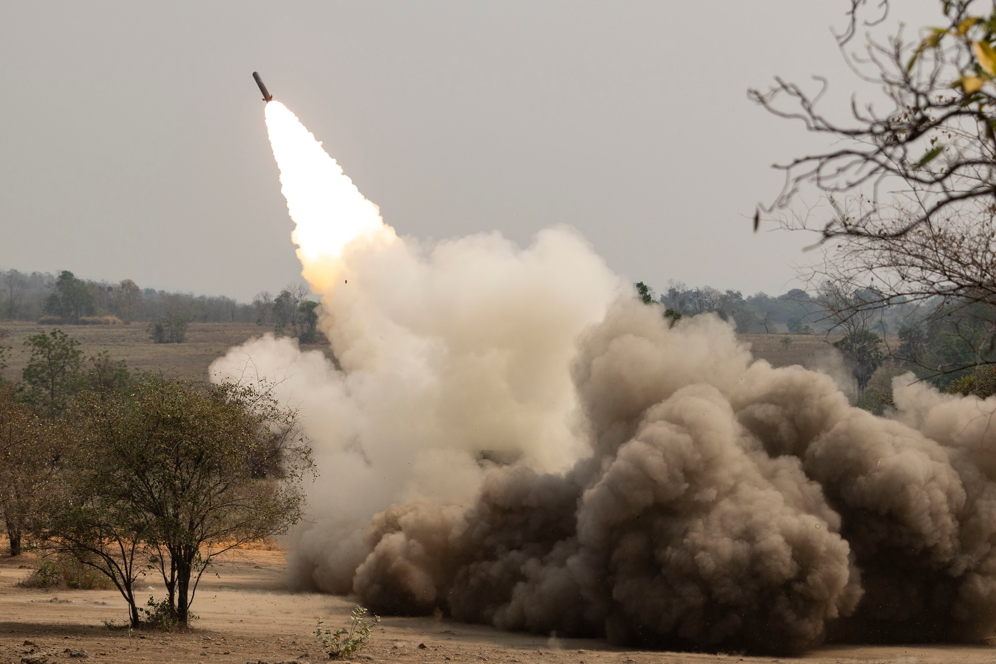 A U.S. Marine Corps High Mobility Artillery Rocket System (HIMARS) from 3rd Battalion, 12th Marines, 3rd Marine Division, fires a M28A2 Reduced Range Practice Rocket during a combined arms live-fire exercise (CALFEX) at Cobra Gold 2023 in the Kingdom of Thailand, March 10, 2023.