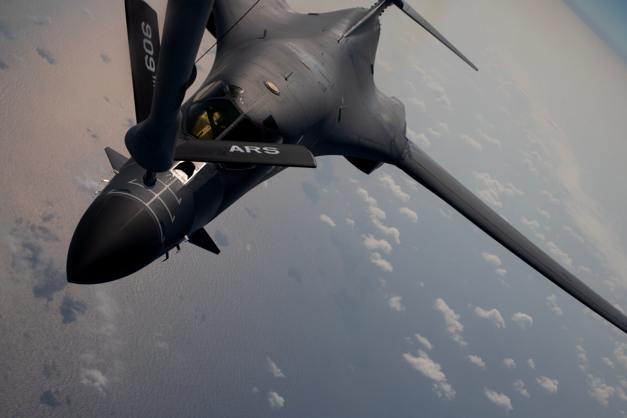 A U.S. Air Force 34th Expeditionary Bomb Squadron B-1B Lancer approaches a 909th Air Refueling Squadron KC-135 Stratotanker during a flight over the Pacific Ocean, March 19, 2023. The United States’ steadfast commitment to security and stability of the Indo-Pacific region remains unchanged. (U.S. Air Force photo by Senior Airman Jessi Roth)