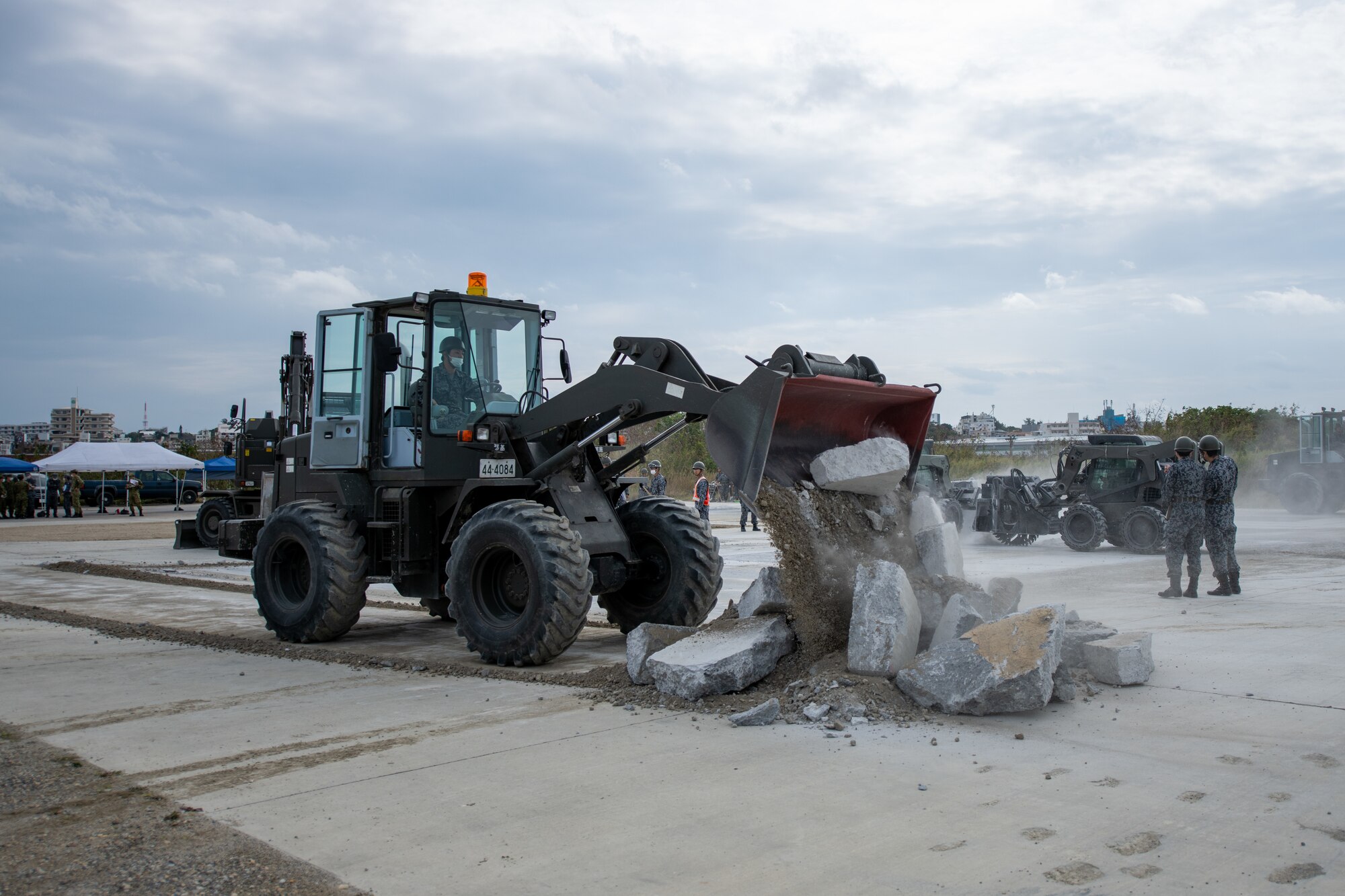 A JASDF member clears debris.