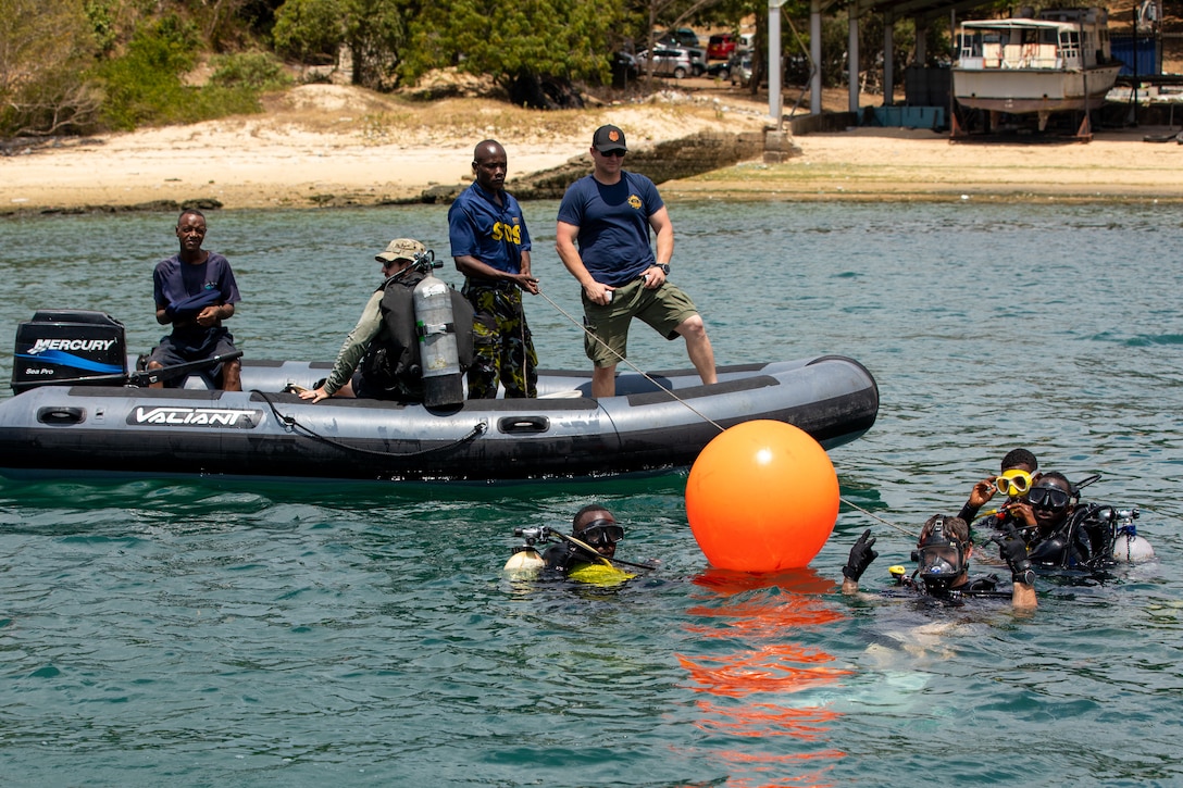 Sailors assigned to Underwater Construction Team (UCT) 1 work alongside Kenyan Navy divers during exercise Cutlass Express 23, March 15, 2022.