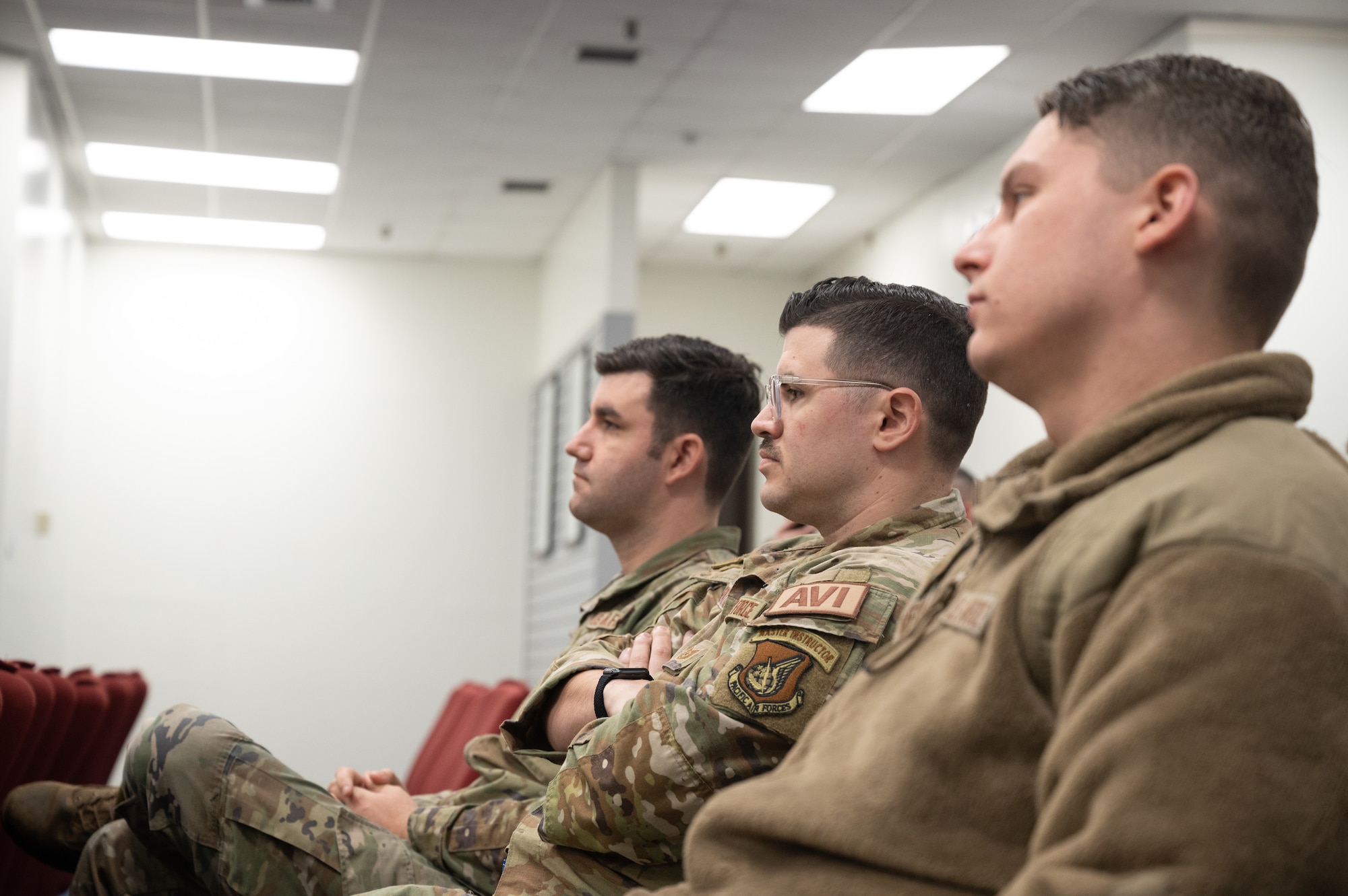 Airmen with the 8th Fighter Wing listen to a senior NCO’s speech at the Professional Enhancement Center at Kunsan Air Base, Republic of Korea, Mar. 16, 2023. The PEC worked with subject matter experts to put on a “CLEP-a-thon” which allowed service members to take free College-Level Examination Program tests and earn college credits toward their degrees. (U.S. Air Force photo by Staff Sgt. Sadie Colbert)