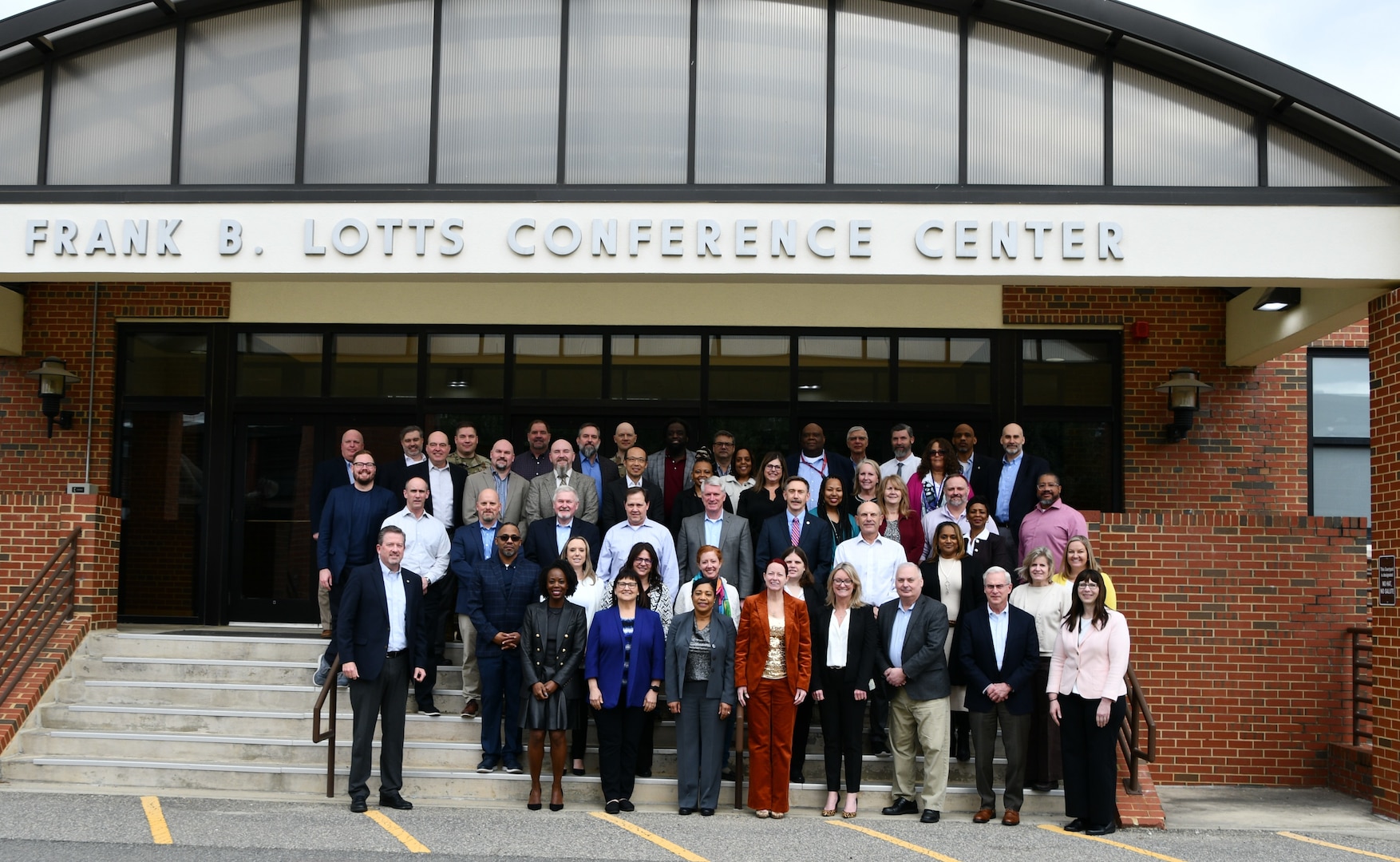 Group of people, who attened the Digital-Business Transformation Offsite, standing in front of Frank B. Lotts Conference Center.