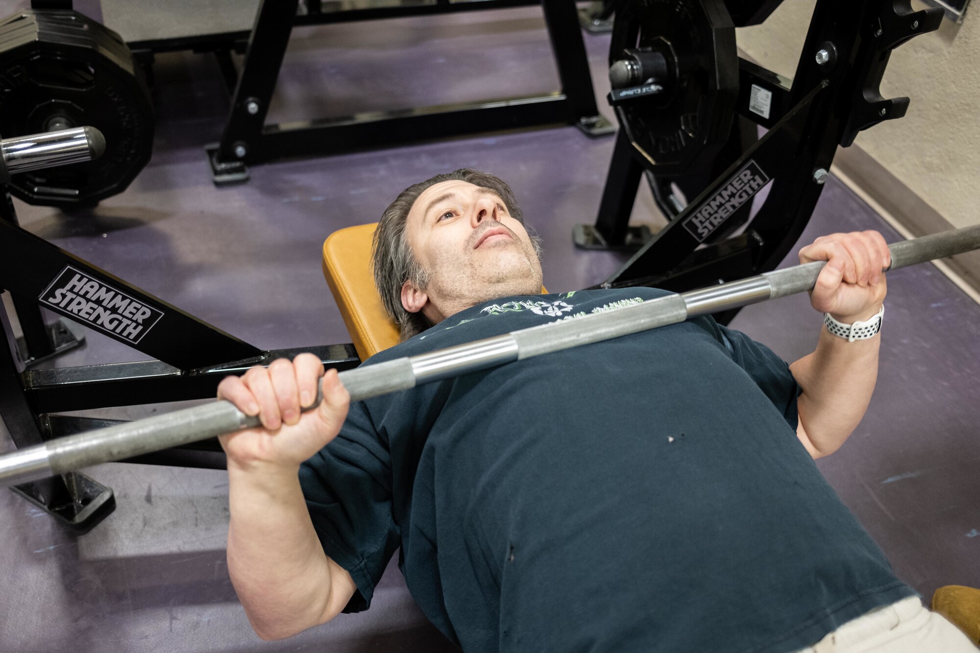 Mr. Eric Neal, 934th Airlift Wing Health Promotion and Fitness Program manager, works out at the Fitness Center at the Minneapolis-St. Paul Air Reserve Station, March 17, 2023. March is national nutrition month, during which Neal provides classes for Airmen devoted to better sleep, nutrition, and exercise habits. (U.S. Air Force photo by Master Sgt. Trevor Saylor)